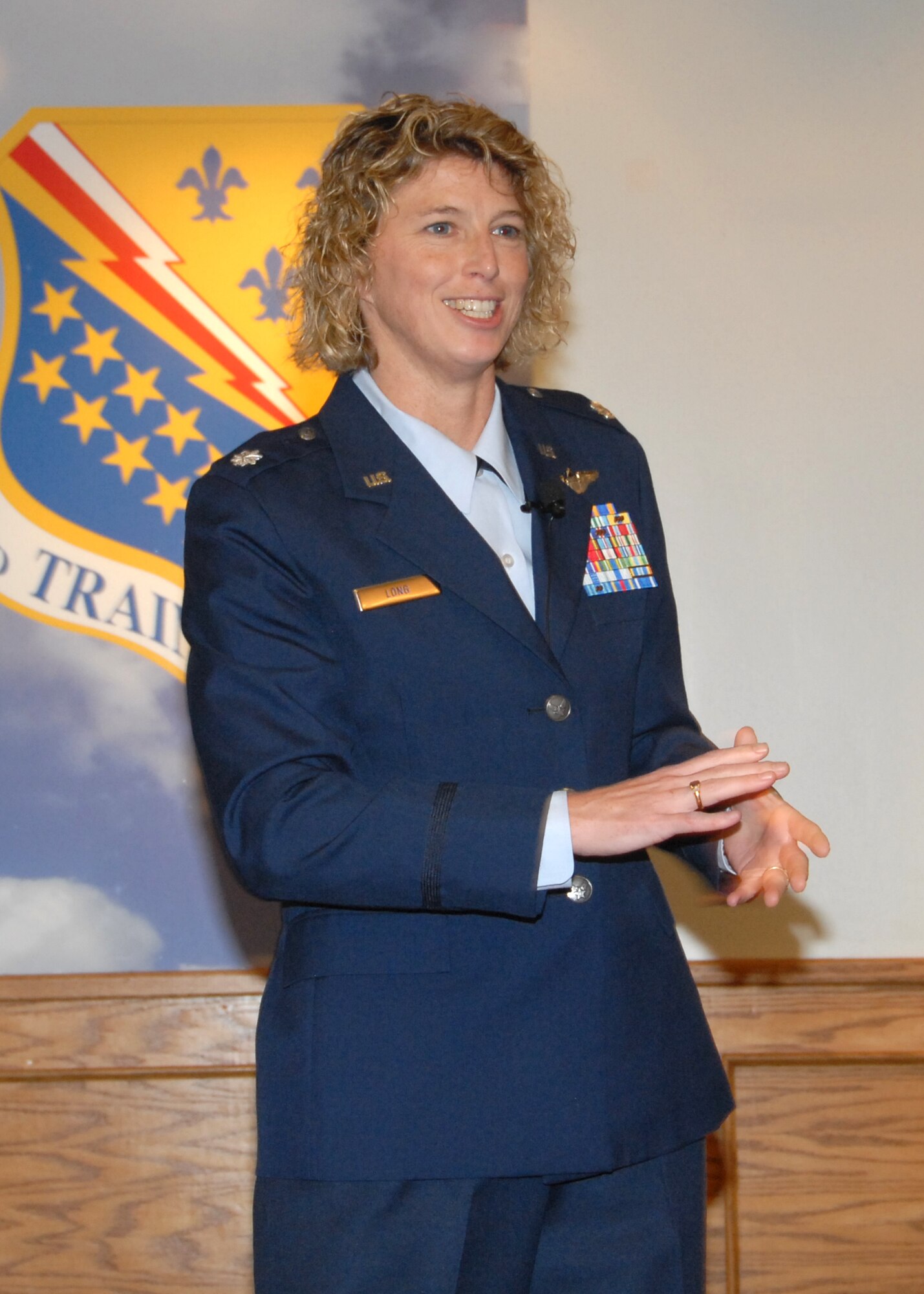 Lt. Col. Jill Long, a T-6 instructor pilot and director of staff at the 80th Flying Training Wing, speaks at the Women’s History Month luncheon March 27 at the Sheppard Club. (U.S. Air Force photo/Mike Litteken)