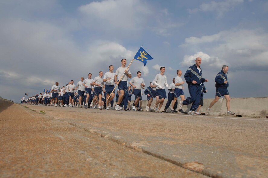 SHAW AIR FORCE BASE, S.C.-- Col. James Post, 20th Figher Wing commander, leads a large portion of the Wing's, more than 4500, active duty members on a 3.1 mile valor run on the flight line recently. The valor run promotes wing-wide esprit de corps and camaraderie.  Physical fitness is a key factor in maintaining air expeditionary readiness.  (U.S. Air Force photo/Staff Sgt. Nathan Bevier)
