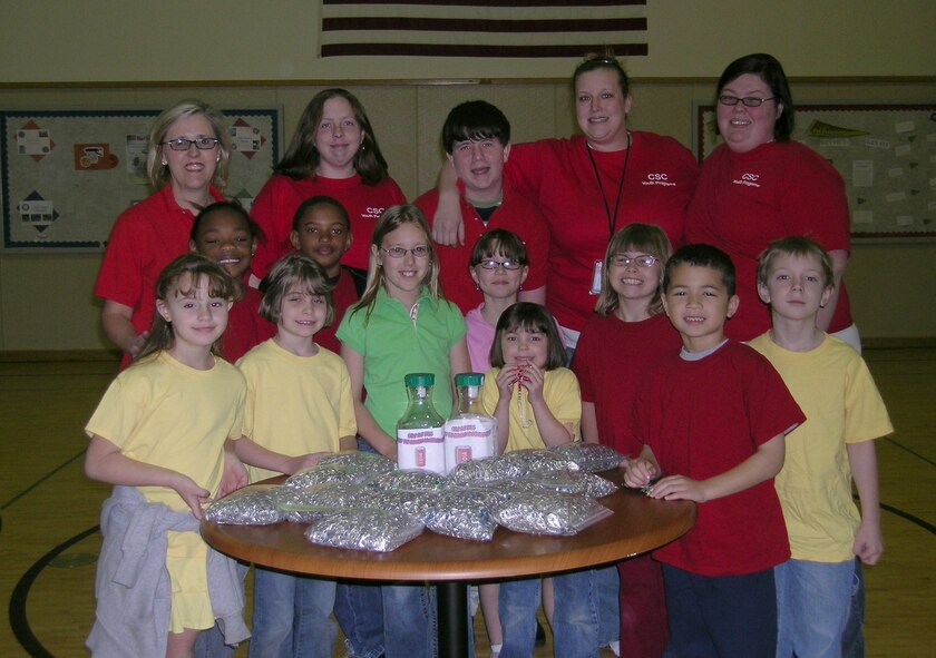 Vance School Age Program staff and children have been collecting beverage pull tabs to help support the Ronald McDonald House of Oklahoma City since last year. They traveled to the Ronald McDonald House of Oklahoma City March 21 to deliver the 14.5 pounds of tabs (approximately 21,605 tabs) collected so far. The participants include (back row) Kim Winfield, Victoria Broder, Thomas Hammons, Kat Betchan and Darrah Sims. (Front row) Macey Vankirk, Alicia Booker, Kasey Colleary, Jahmir Clark, Emily Clow, Taylor McClelland, Heather Keith, Kaitlin Colleary, Alex Papworth and Sam Keith. (U.S. Air Force photo by Melissa Seror)
