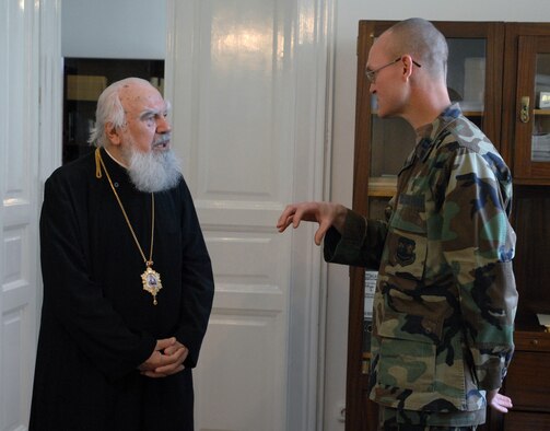 Air Force Chaplain (Capt.) Eric Boyer, 404th Air Expeditionary Group chaplain, meets Romanian Orthodox Church Archbishop Valeriu Anania during a trip to a cathedral in Cluj-Napoka, Romania.  The meeting concluded a "spiritual relations" visit between Romanian Military Chaplains and Chaplain Boyer during his deployment to Campia Turzii, Romania in support of Operation Noble Endeavor.  (U.S. Air Force photo by Tech. Sgt. Eric Petosky)