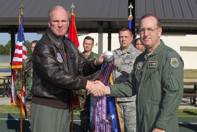 Director of the National Guard Lt. Gen. McKinley presents Commander of 1st Air Force (AFNORTH) Maj. Gen. Morrow with The Air Force Outstanding Unit Award at Tyndall Air Force base March 21. 
