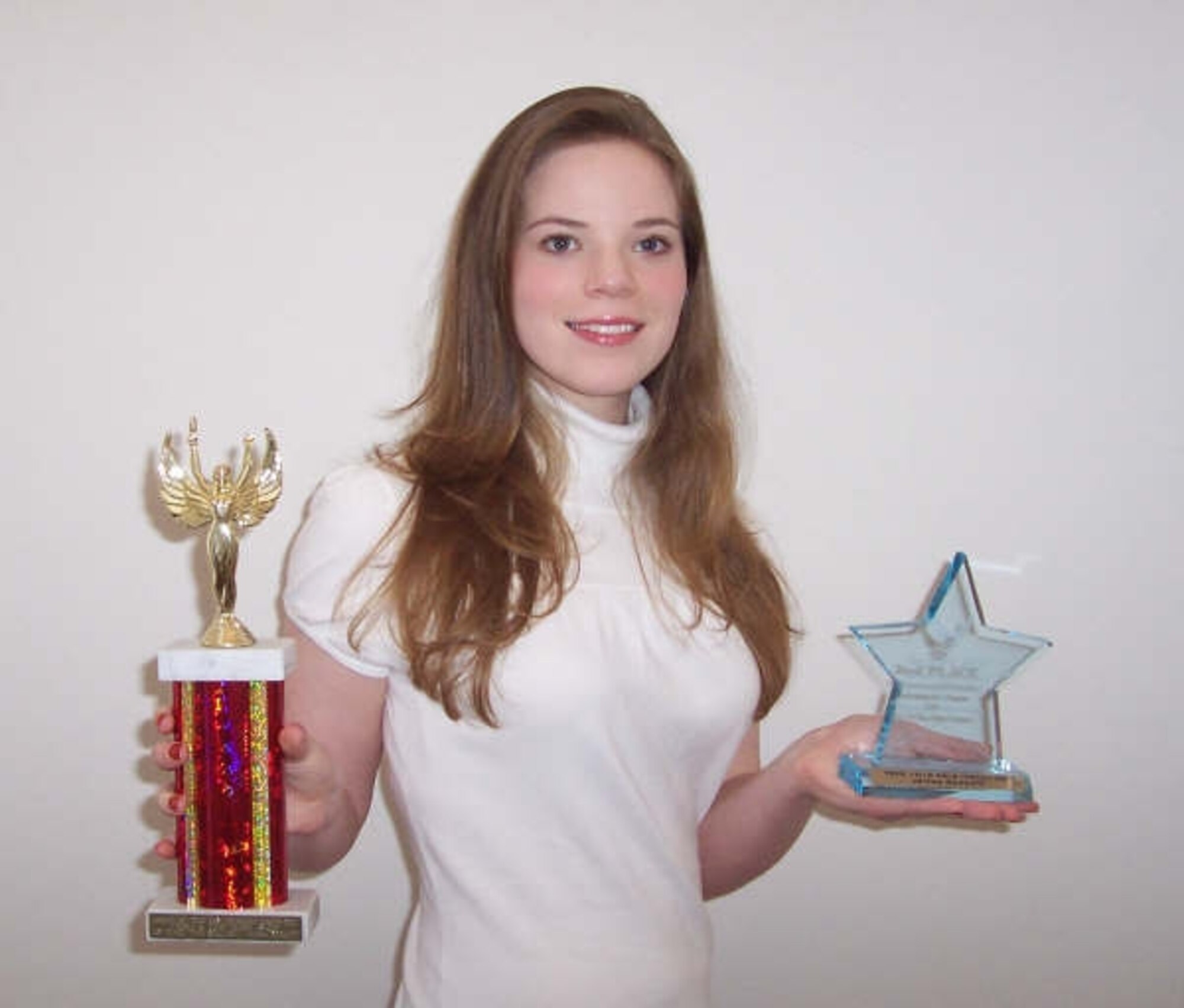 LANGLEY AIR FORCE BASE, Va. -- Jenna Rockett, daughter of Lt. Col. Kyle Rockett, Air Operations Squadron Delivery Control flight commander and Tina Rockett, won second place for her age group for the 2007 Air Force Family & Teen Talent Program and Commemorative Contest. Jenna competed against vocalists in her age group from 46 bases.  (Photo courtesy/Jenna Rockett)