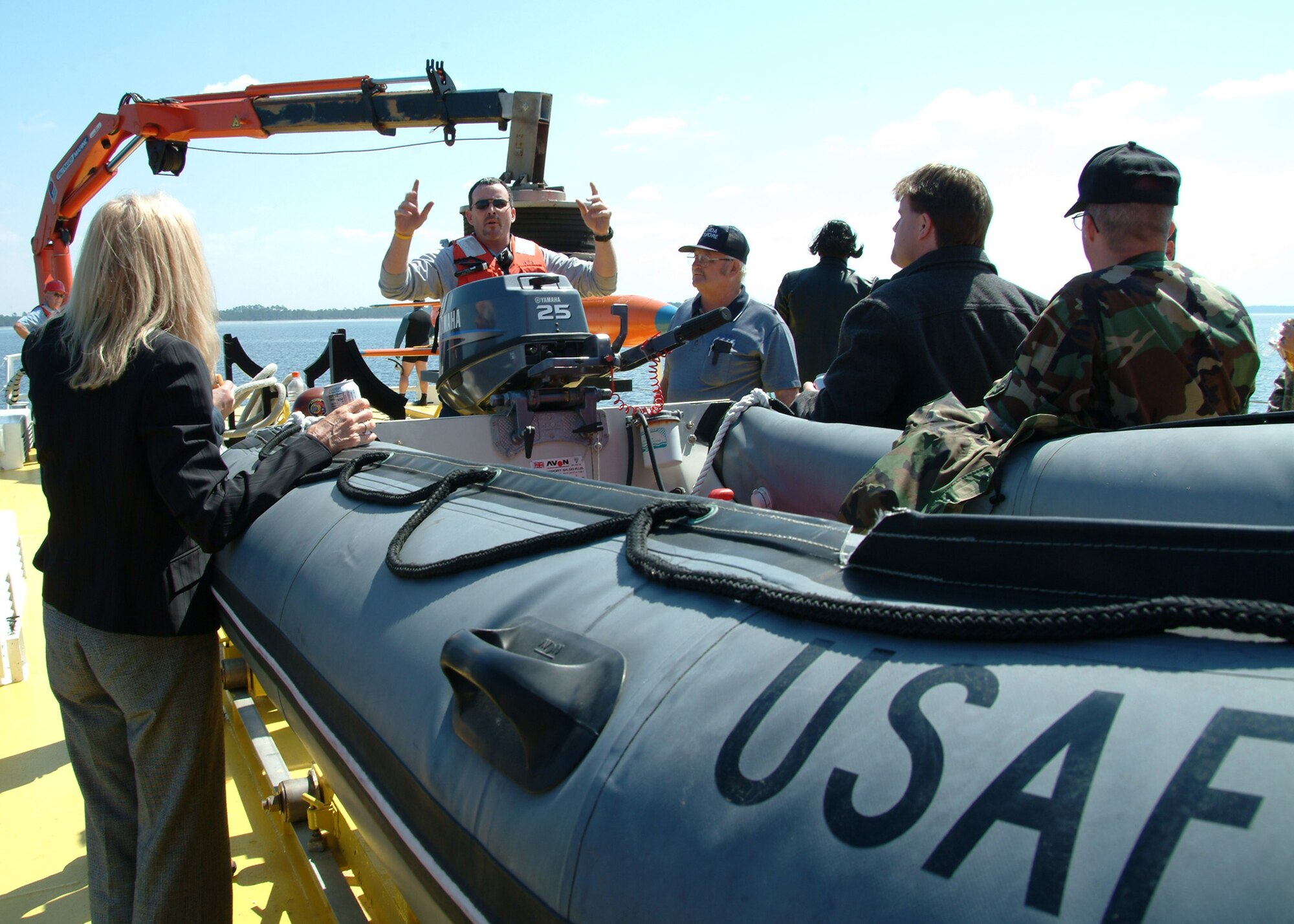 John Wise briefs a tour group on sub-scale drone recovery before his team demonstrates it, March 26 in the waters off of Tyndall Air Force Base, Fla.  The ship used for recovery is one of only three 120-foot boats owned by the Air Force.  They are contracted from Florida Offshore through the 82nd Aerial Targets Squadron to help recover sub-scale drones after they are shot down during live fire exercises.  Photo by Staff Sgt. Samuel King Jr.