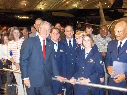 WRIGHT-PATTERSON AFB, Ohio - Reservists from the 445th Airlift Wing Logistics Readiness Squadron were among the selected airmen to attend President Bush's speech at the National Museum of the U.S. Air Force here March 27,2008.  Pictured with President George Bush are Staff Sgt. Anna Tracy, Command Chief Aaron Mouser, 445th Airlift Wing, Staff Sgt. Kira Zyski, and Staff Sgt. Leah Smith.  The President's 40 minute speech focused on the importance of the United States continuing its military and economic aid to Iraq.