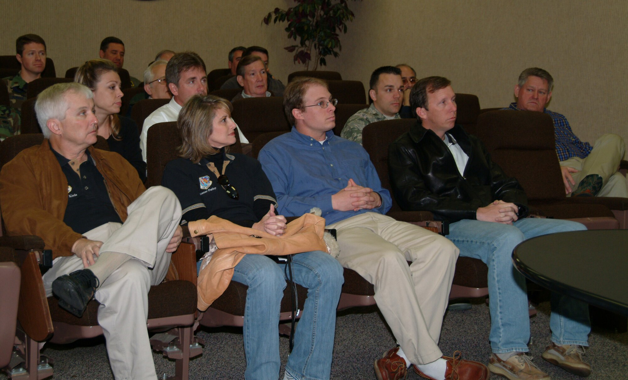 Honorary Commanders Greg Kisela, 28th Test and Evaluation Squadron, Jeanne Dailey, 68th Electronic Warfare Squadron, Brian Burger, 36th Electronic Warfare Squadron, and Brett Hinely, 53d Wing honorary alumni president, listen to the mission brief on the 82nd Aerial Targets Squadron before kicking off a tour of the 53 Weapons Evaluation Group facilities at Tyndall Air Force Base, Fla., March 26.  Photo by Master Sgt. Andrew Leonhard.
