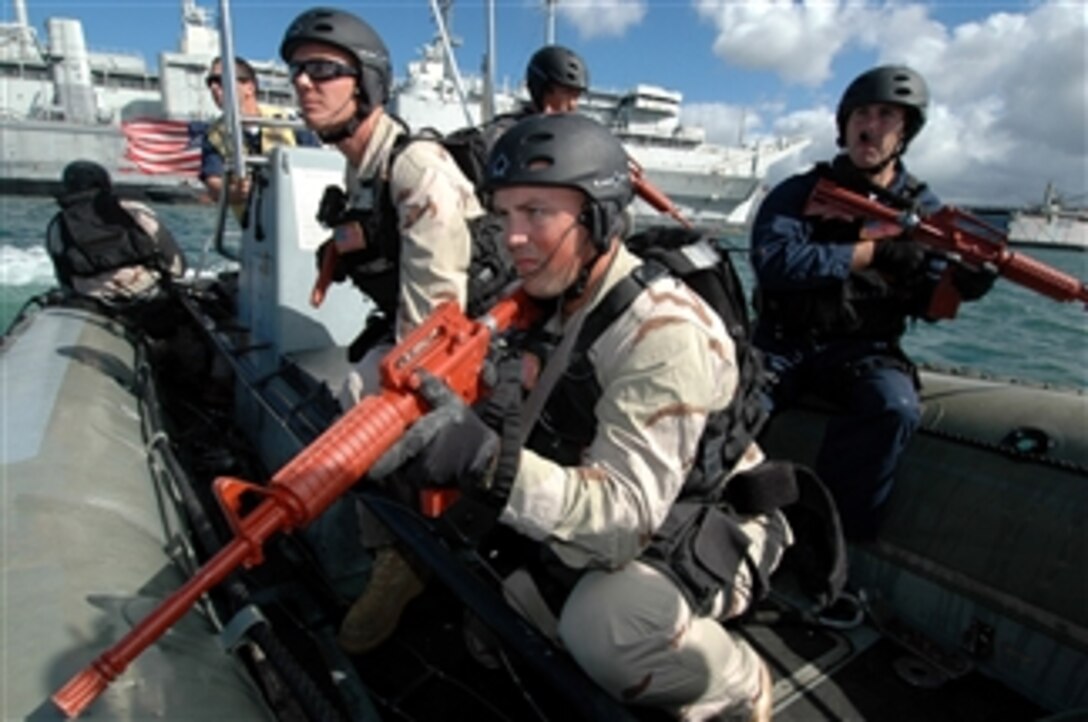 Sailors assigned to the visit, board, search, and seizure team aboard the guided-missile destroyer USS Chung-Hoon conduct a boarding drill aboard the decommissioned amphibious transporting dock ship USS Duluth, March 26, 2008. 