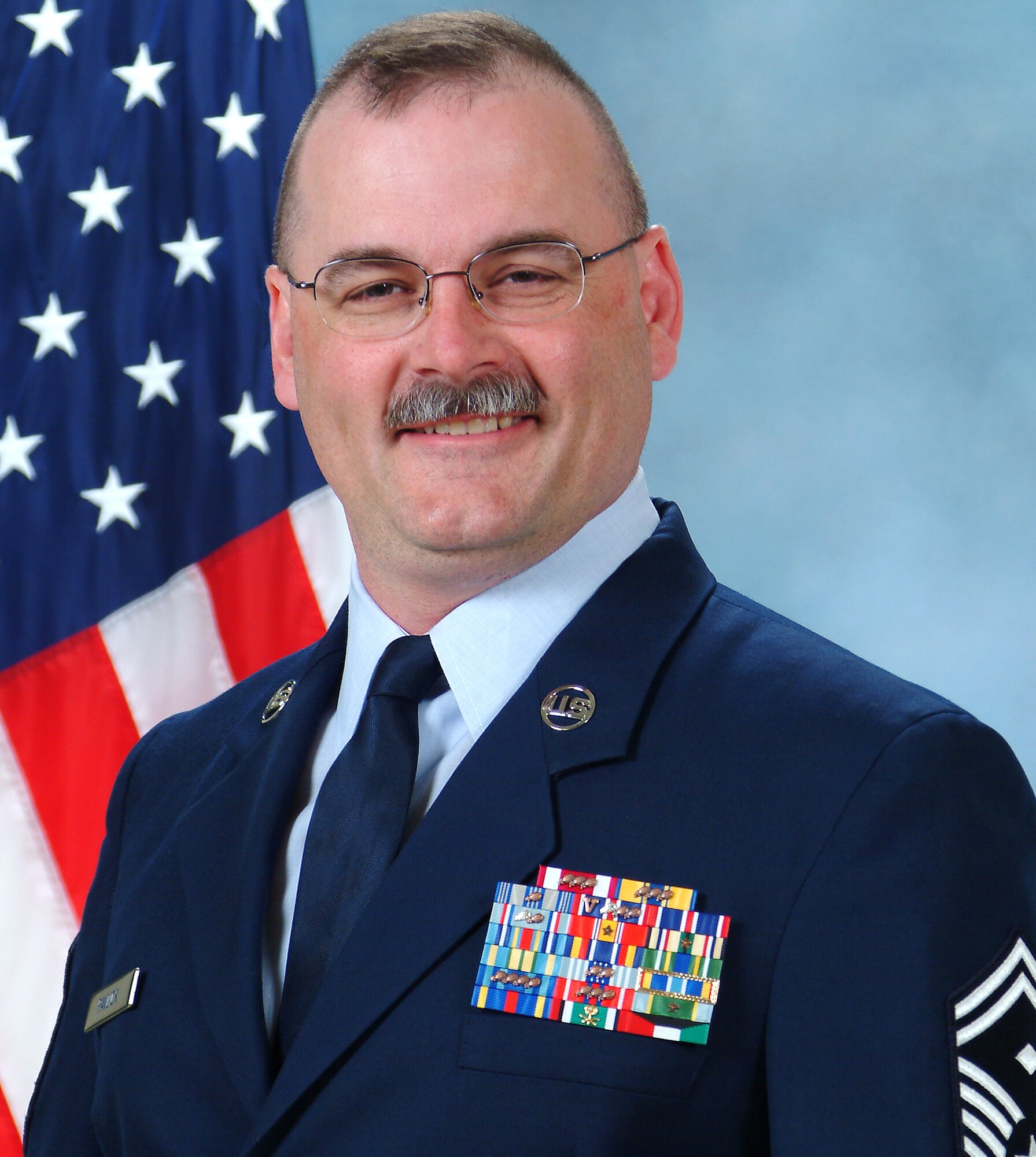 Master Sgt. Thomas Pavlick, the Team Peterson First Sergeant of the Year, was the led for organizing nine deployed family dinners, supporting more than 1,300 family members. He was also the vice president of Team Pete's Operation Warm Heart, providing 250 needy families with Thanksgiving food baskets. Sergeant Pavlick also authored the 21st Space Wing's supplement to Air Force Instruction 36-2903 and was the Air Force Sergeant's Association division 11 vice present and divison 11 and 12 convention planning committee leader. (U.S. Air Force photo)
