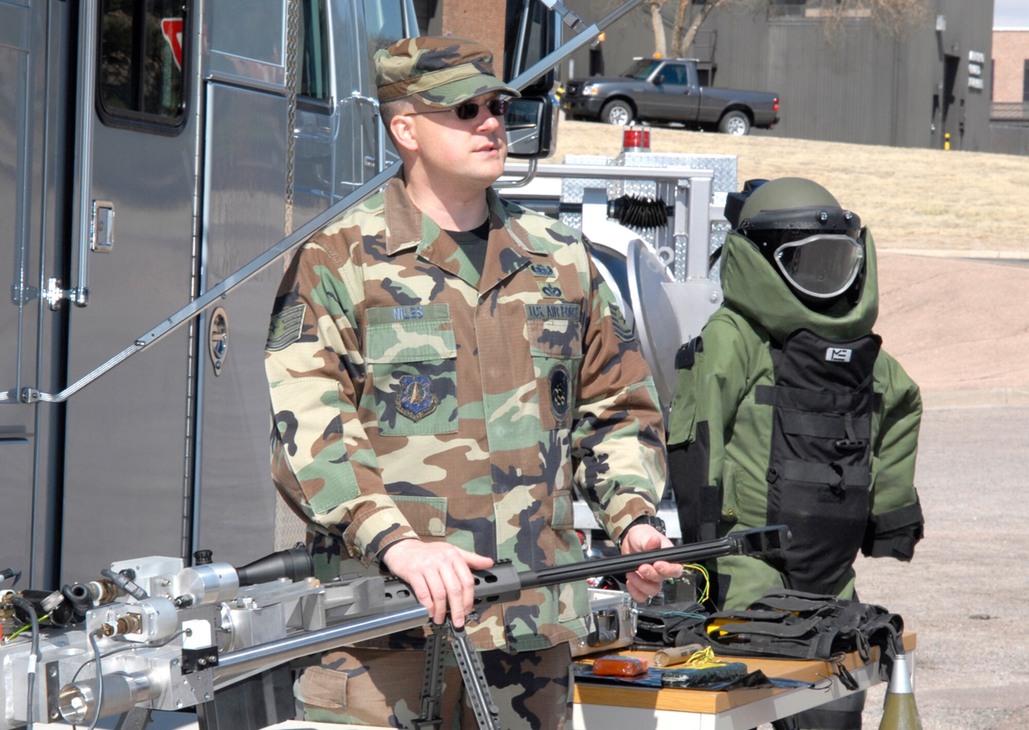 Tech. Sgt. Greg Niles, 21st Civil Engineer Squadron, showcases emergency response equipment to Colorado Springs-area civic leaders during a 30-Group tour March 27 at Peterson Air Force Base, Colo. During the visit, the Colorado 30-Group received a Peterson Blueprint 2050 briefing and general information on the base. The group works closely with area commanders to assist them in fulfilling their missions and roles by creating better understanding and education between military and civilian leadership throughout Colorado through frequent meetings, briefings and visitations. (U.S. Air Force photo/Roberta McDonald)