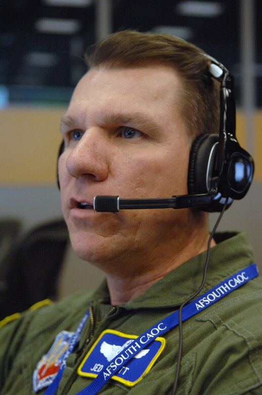 Maj. Jed Scott, 612th Air Operations Center air mobility division, coordinates support for ongoing and future missions here March 27. (U.S. Air Force photo by Airman 1st Class Noah R. Johnson) 