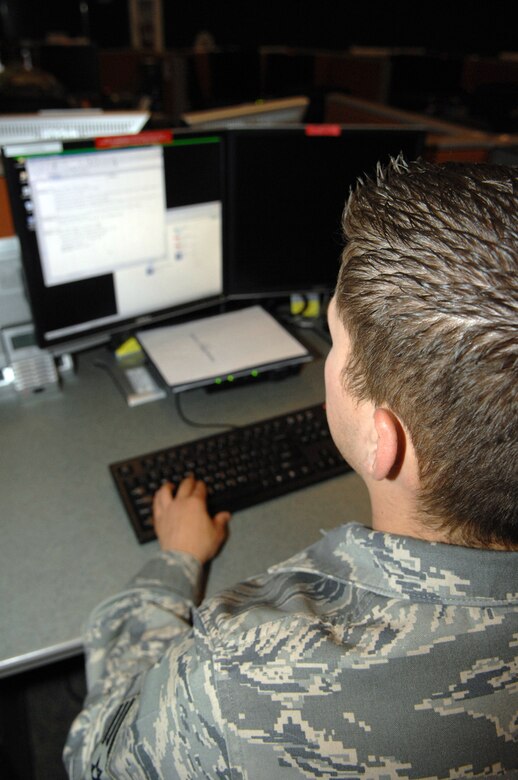 Senior Airman Myrtile Martinez, 612th Air Operations Center intelligence, surveillancea and reconnaissance operations division, updates the ISR database here March 27. (U.S. Air Force photo by Airman 1st Class Noah R. Johnson)