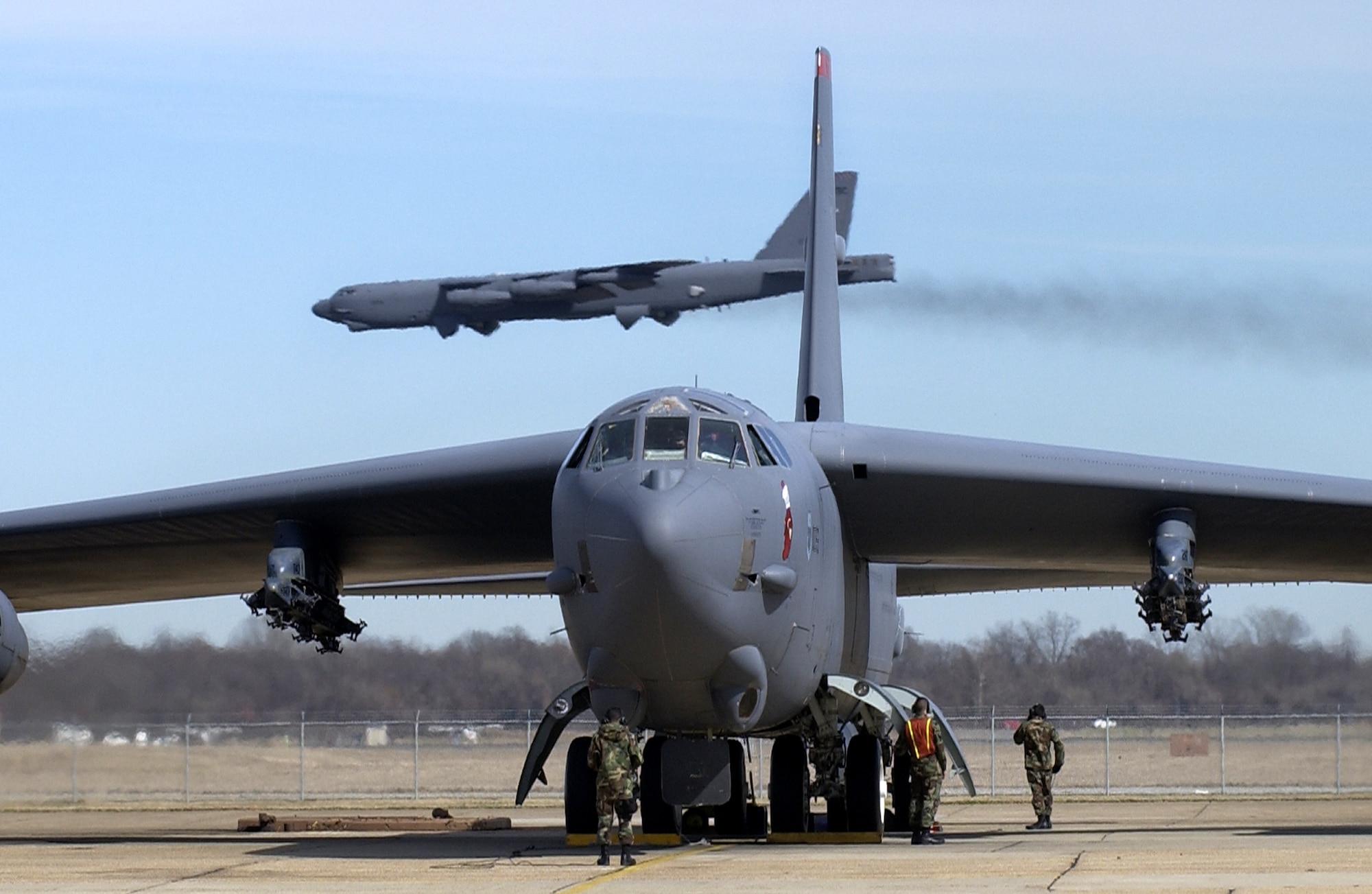 BARKSDALE AIR FORCE BASE, La. – A B-52 prepares for departure as another B-52 arrives. The B-52 is capable of flying 8,800 miles without refueling and can carry a weapons load of up to 70,000 pounds. (U.S. Air Force photo by Tech. Sgt. Robert Horstman.
