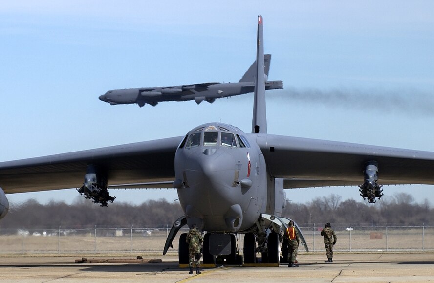 BARKSDALE AIR FORCE BASE, La. – A B-52 prepares for departure as another B-52 arrives. The B-52 is capable of flying 8,800 miles without refueling and can carry a weapons load of up to 70,000 pounds. (U.S. Air Force photo by Tech. Sgt. Robert Horstman.
