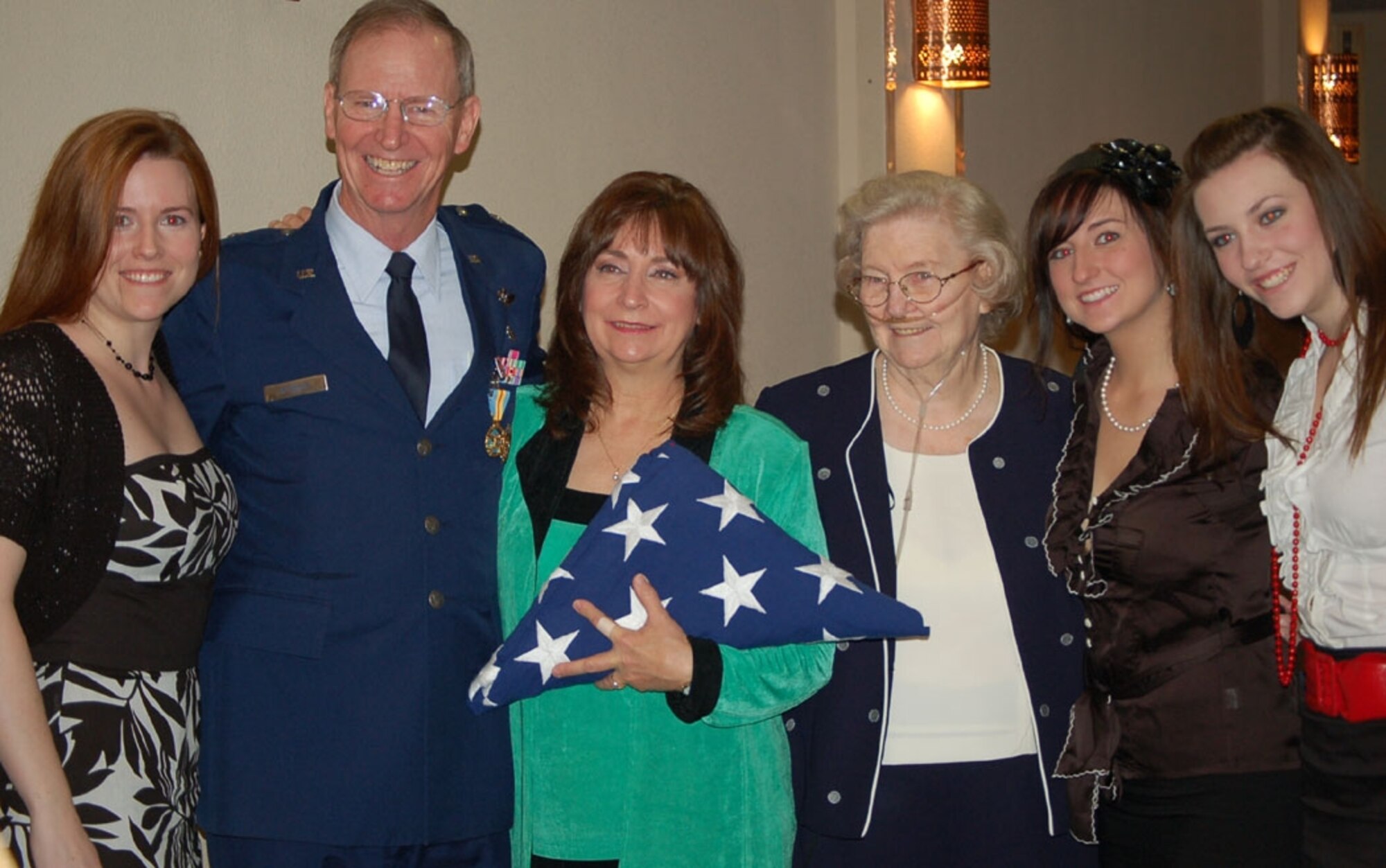 Brig. Gen. (Dr.) Charles L. O’Toole, mobilization assistant to the Air Force deputy surgeon general, retired from the Air Force in a ceremony led by Maj. Gen. (Dr.) Charles B. Green, Air Force deputy surgeon general Jan. 5 at the Gateway Club at Lackland AFB, Texas.  General O’Toole entered military service as an Army Health Professions Scholarship Program recipient in 1973.  Pictured from left to right are: Patricia O’Toole, daughter; General O’Toole; Ellen O’Toole, wife; Gladys O’Toole, mom; Kathleen O’Toole, daughter; and Erin O’Toole, daughter.  (U.S. Air Force photo by Maj. Elena T. Milford)
