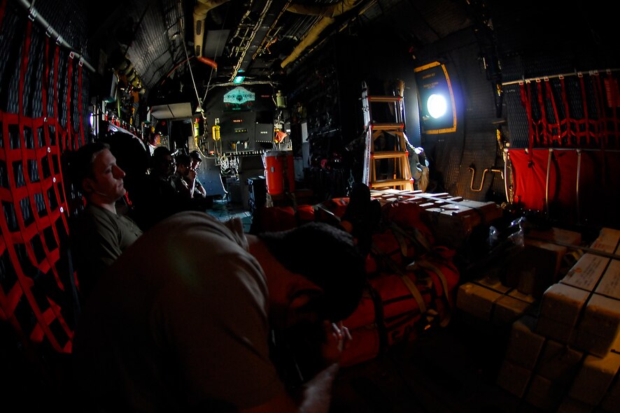 MOODY AIR FORCE BASE, Ga. – Pararescuemen with the 38th Rescue Squadron await the call to action aboard a 71st Rescue Squadron HC-130P during the search for a missing sailboat in the Gulf of Mexico March 26. Had the boat been discovered and required assistance, the “PJ’s” would have deployed with an inflatable boat and supplies to render aid to the stricken mariners. (U.S. Air Force photo by Tech. Sgt. Parker Gyokeres)