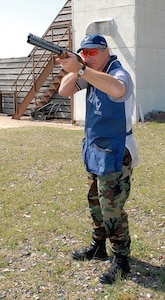 Lt. Col. Dominic Grazioli takes aim during a practice shooting session.