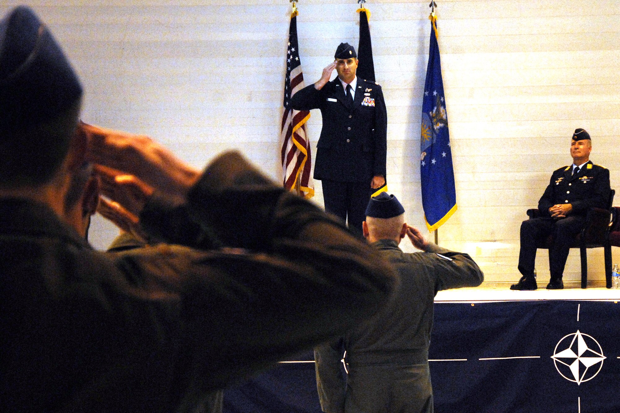 Lt. Col. Michael Messer commits his first official duty as commander with a salute to Airmen in the 80th Operations Support Squadron. The colonel replaced Lt. Col. Joseph Less, who will serve as a deputy group commander in Germany. (U.S. Air Force photo/Harry Tonemah)