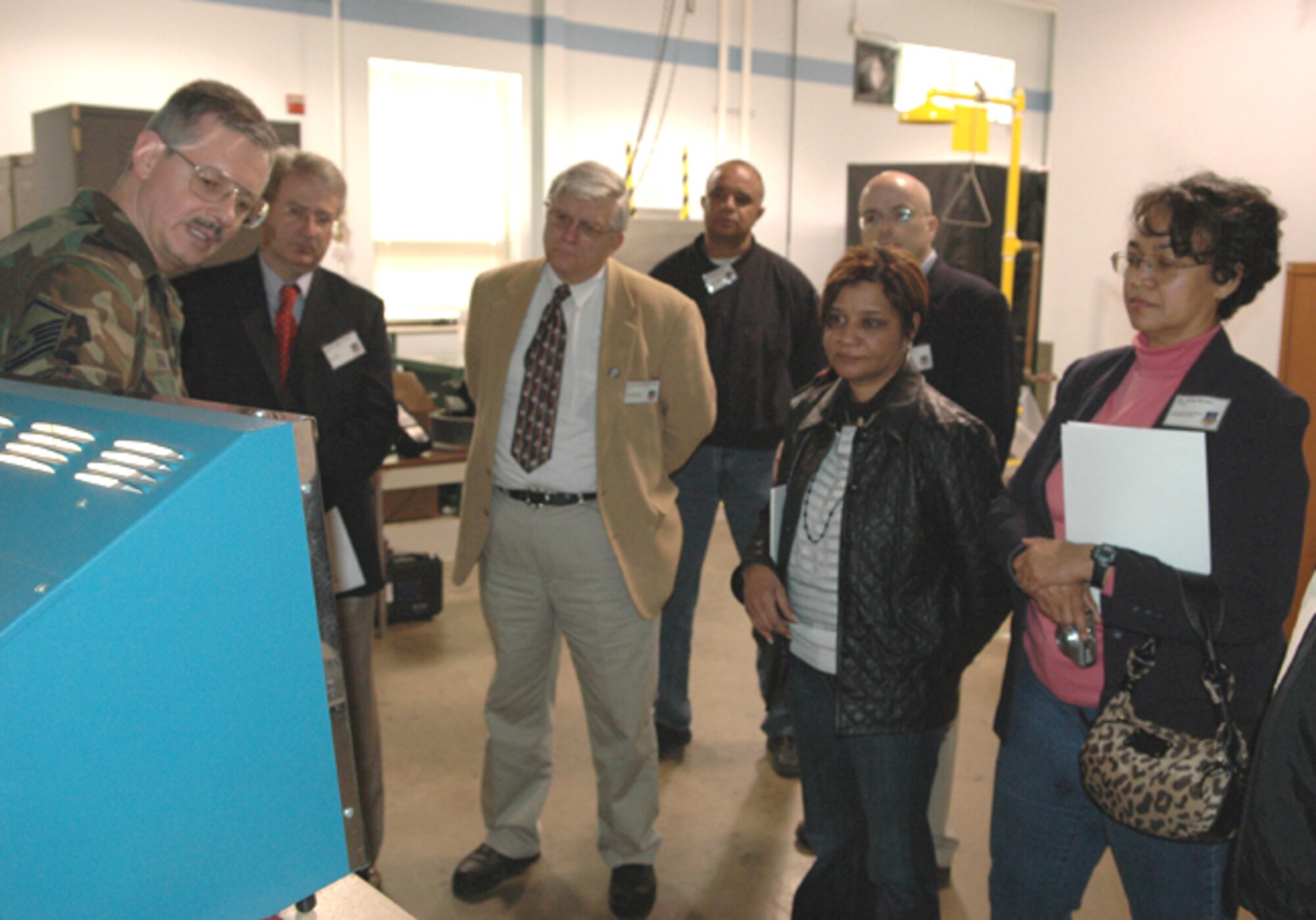 GRISSOM AIR RESERVE BASE, Ind., --  Master Sgt. Roy Goins, a nondestructive inspection craftsman with the 434th Maintenance Squadron, shows a group of civic leaders some of the equipment he uses in his job.  The visit to the maintenance squadron was one of the tour stops a group of 29 civic leaders had during their visit to the base.  (U.S. Air Force photo/Senior Airman Carl Berry)