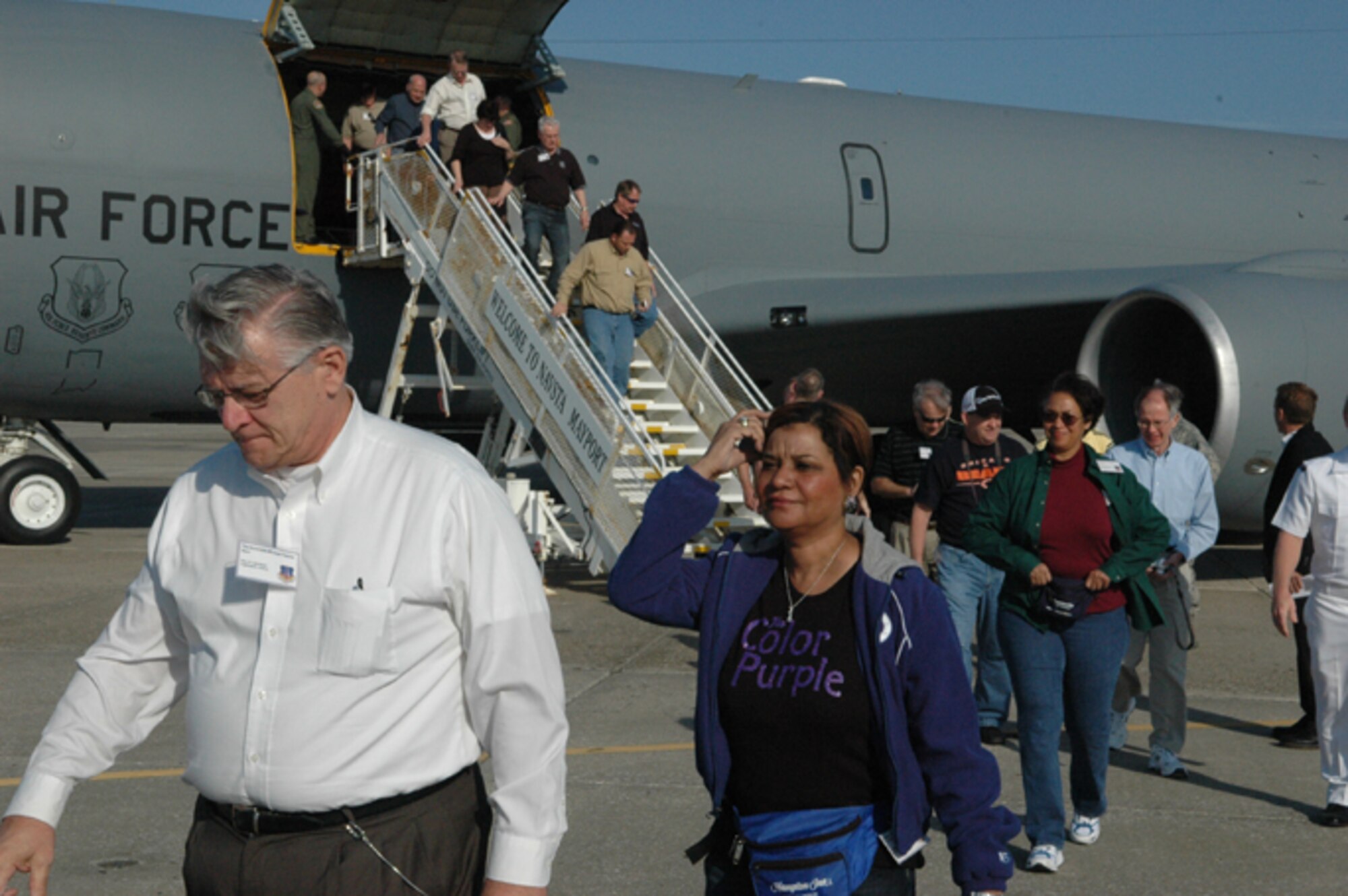 GRISSOM AIR FORCE BASE, Ind., -- Mike Fincher(left) and Nancy Jewell lead a group of civic leaders as they depart a KC-135R Stratotanker after arriving at Naval Station Mayport, Fla.  During this tour stop, the group toured the USS Dewert. The civic leaders were part of a special 434th Air Refueling Wing outreach program that visited Grissom ARB, Patrick AFB and Mayport.  (U.S. Air Force photo/Senior Airman Carl Berry) 