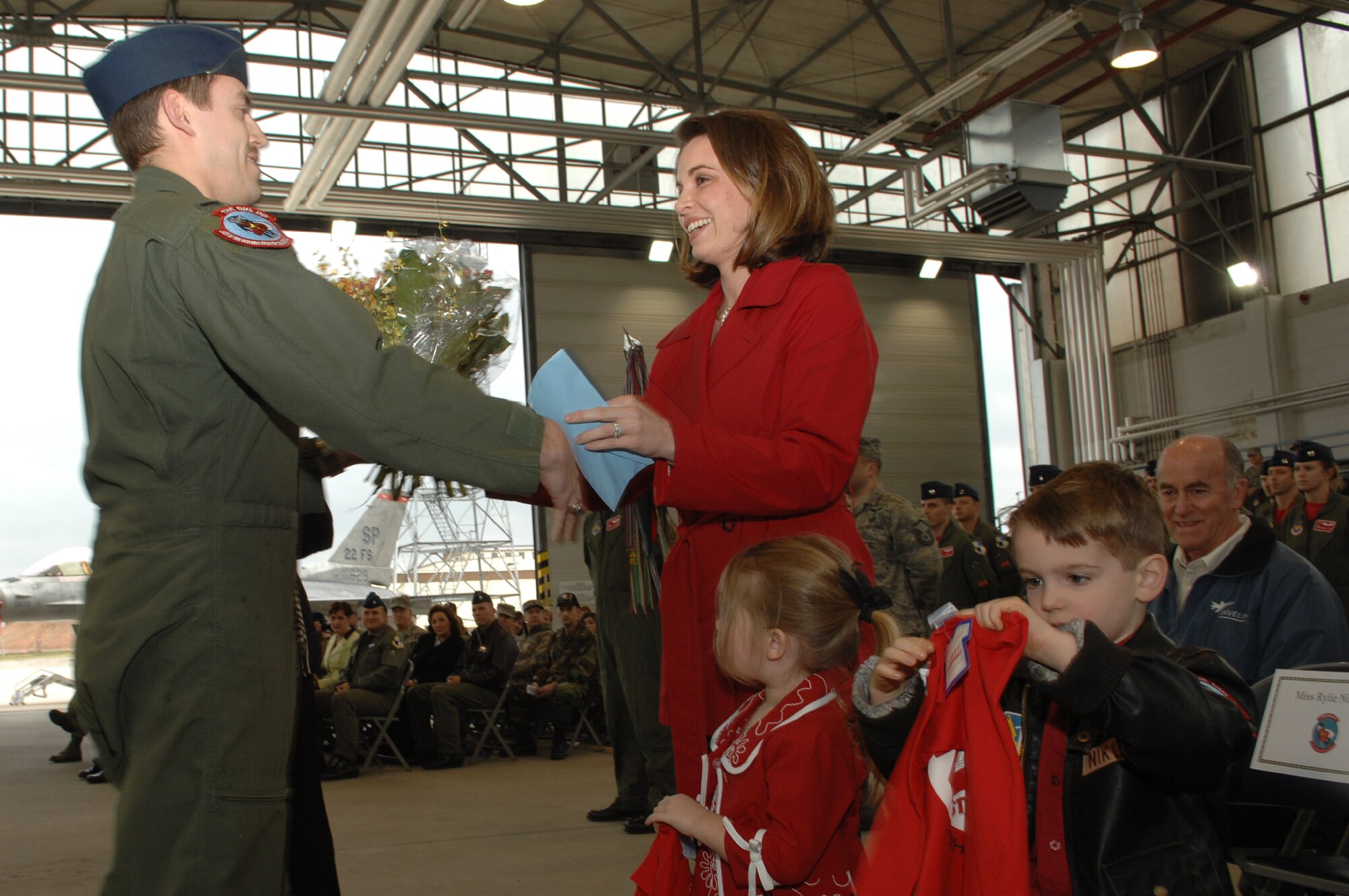 SPANGDAHLEM AIR BASE, Germany – Lt. Col. Matt Chesnutt, former 22nd Fighter Squadron commander, thanks his family for their support. After relinquishing commander of the 22nd Fighter Squadron, Colonel Chesnutt became the deputy commander of the 52nd Operations Group. (U.S. Air Force photo/Senior Airman Logan Tuttle)