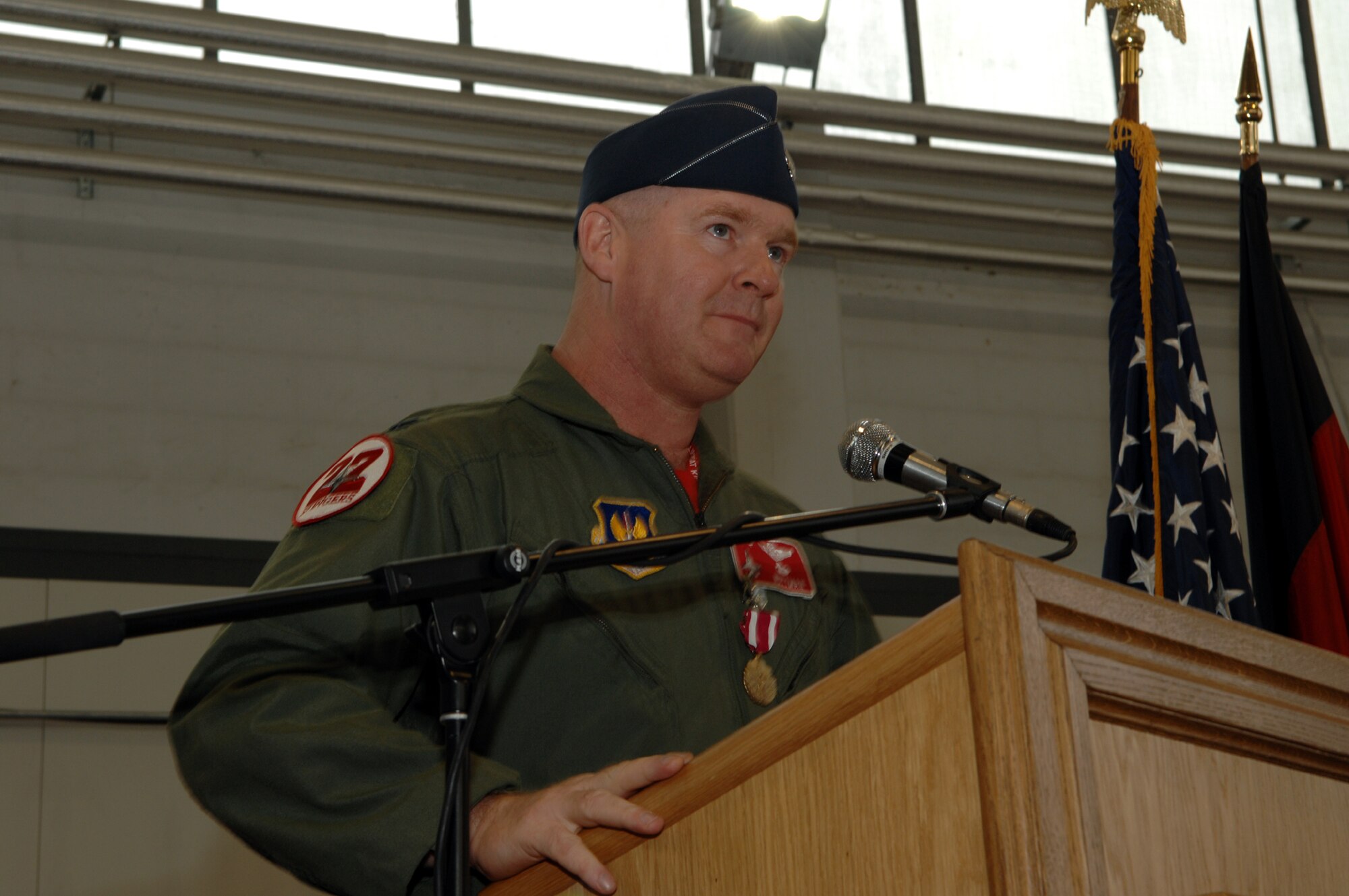 SPANGDAHLEM AIR BASE, Germany – Lt. Col. Matt Chesnutt, former 22nd Fighter Squadron commander, thanks members of the base for their support. After relinquishing commander of the 22nd Fighter Squadron, Colonel Chesnutt became the deputy commander of the 52nd Operations Group. (U.S. Air Force photo/Senior Airman Logan Tuttle)