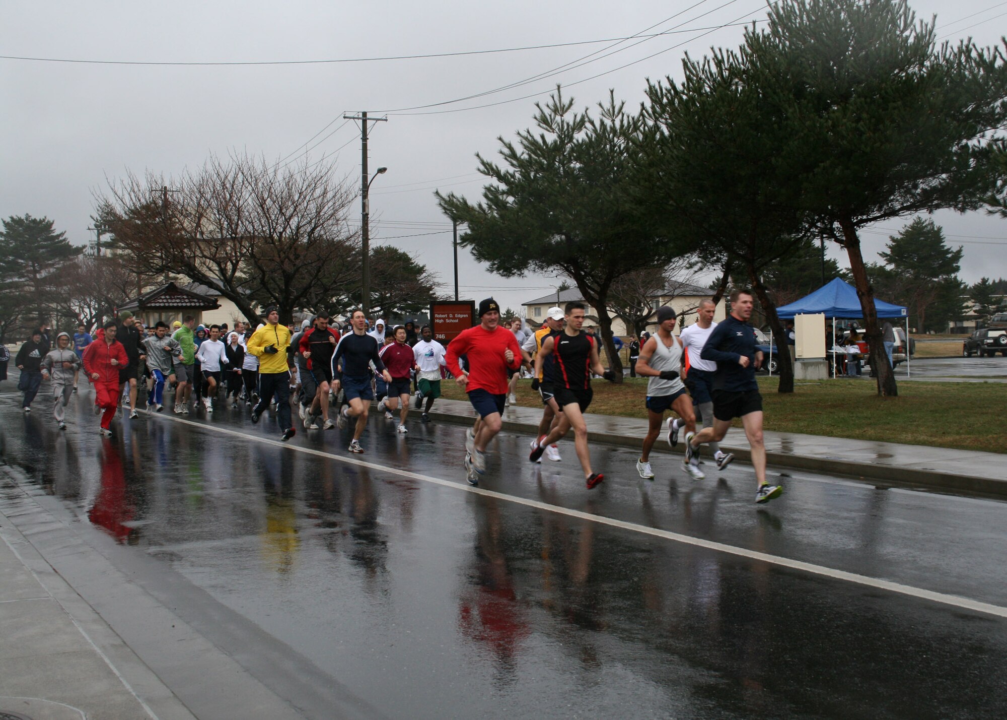 MISAWA AIR BASE, Japan -- More than 200 runners begin the first 5K fun run of 2008 at Edgren High School March 29, 2008. The first meeting of the Misawa Flyers Running Club was held immediately after the run. (U.S. Air Force photo by Abigail Douglass)