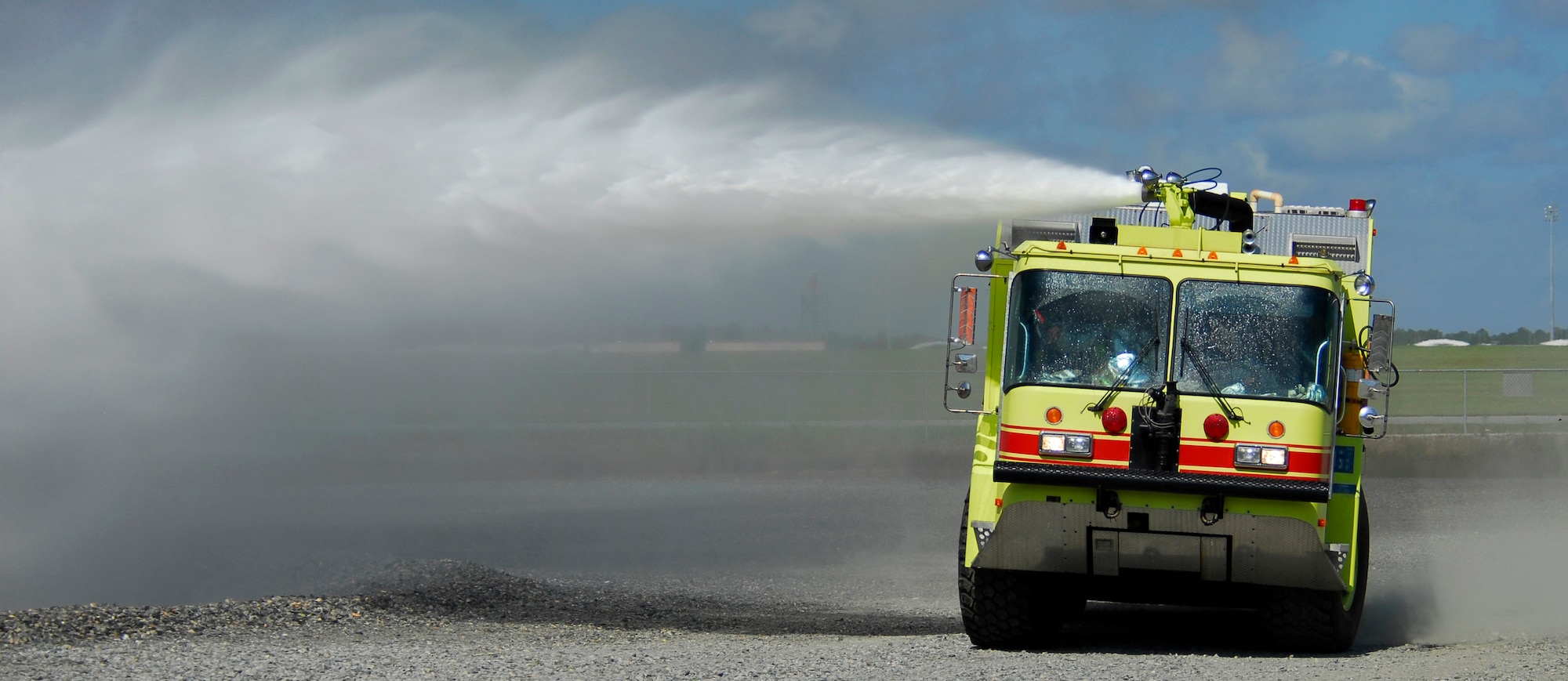 MOODY AIR FORCE BASE, Ga. -- An aircraft crash response fire truck from the 23rd Civil Engineering Squadron Emergency Services Flight arrives onto the scene of a training exercise at the base's aircraft burn pit April 25.  The facility was recently brought back into operation after more than a year of repairs by the base's civil engineers.  (U.S. Air Force photo by Tech. Sgt. Parker Gyokeres) 