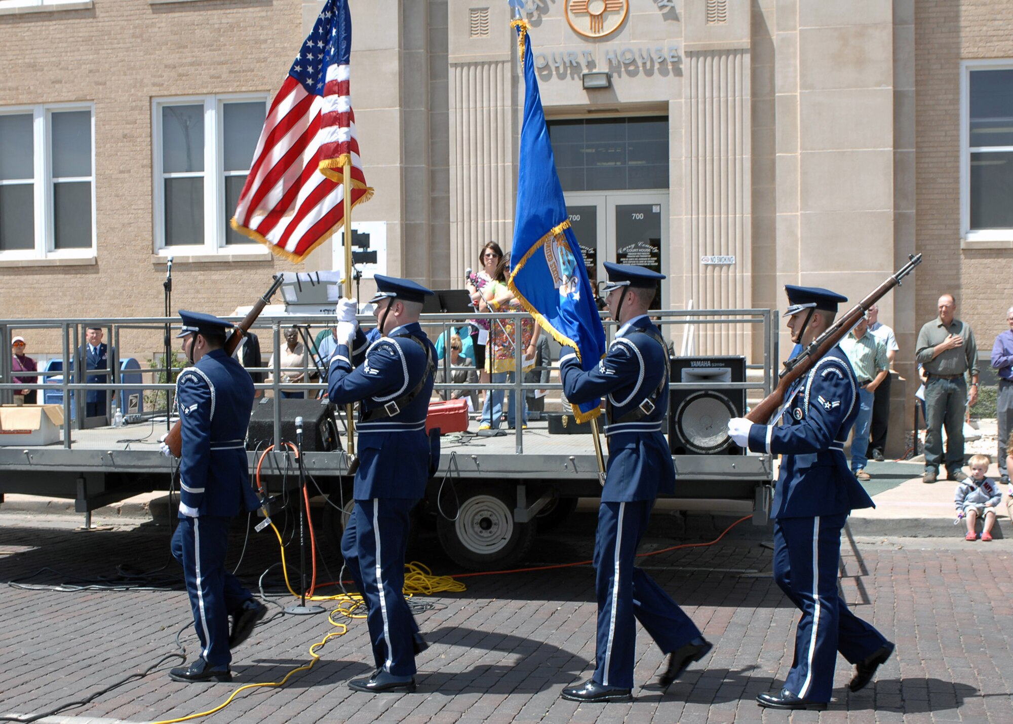 CANNON AIR FORCE BASE, N.M. - Members of the base honor guard present the colors in front of the Curry County courthouse May 1. The presentation of colors was part of a National Prayer Day observance. (U.S. Air Force photo/Airman Basic Danielle Martin)