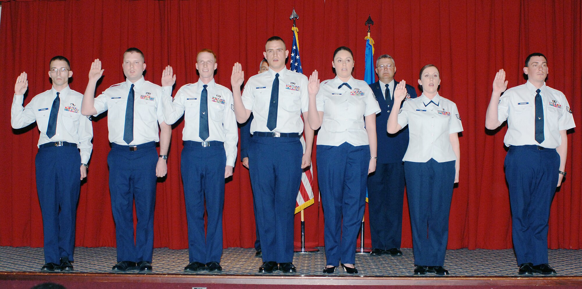 FAIRCHILD AIR FORCE BASE, Wash. – Newly promoted staff sergeants recite the Non-commissioned Officer Charge during the Wing Promotion Ceremony April 30. More than 30 Airmen were recognized at the ceremony. (U.S. Air Force photo / Airman 1st Class Melissa Barnett)