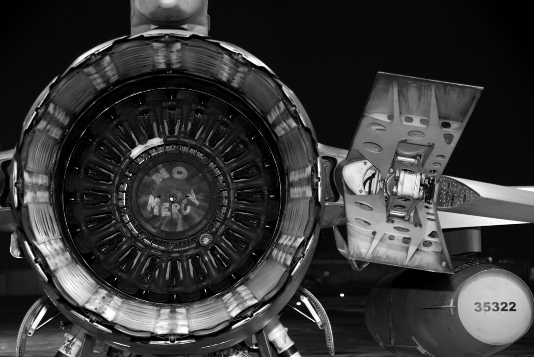 An F-16C Fighter Aircraft from the 332nd Expeditionary Fighter Wing, Balad Air Base, Iraq is maintenance ready for duty while housed under a Hardened Aircraft Shelter.  Wisconsin Air National Guard personnel from the 115th Fighter Wing are currently deployed here in support of Operation Iraqi Freedom.  Maintenance crews work around the clock to ensure these aircraft are ready to support operations in Iraq. (U.S. Air Force photo by Staff Sgt. Katherine Kane) (Released)