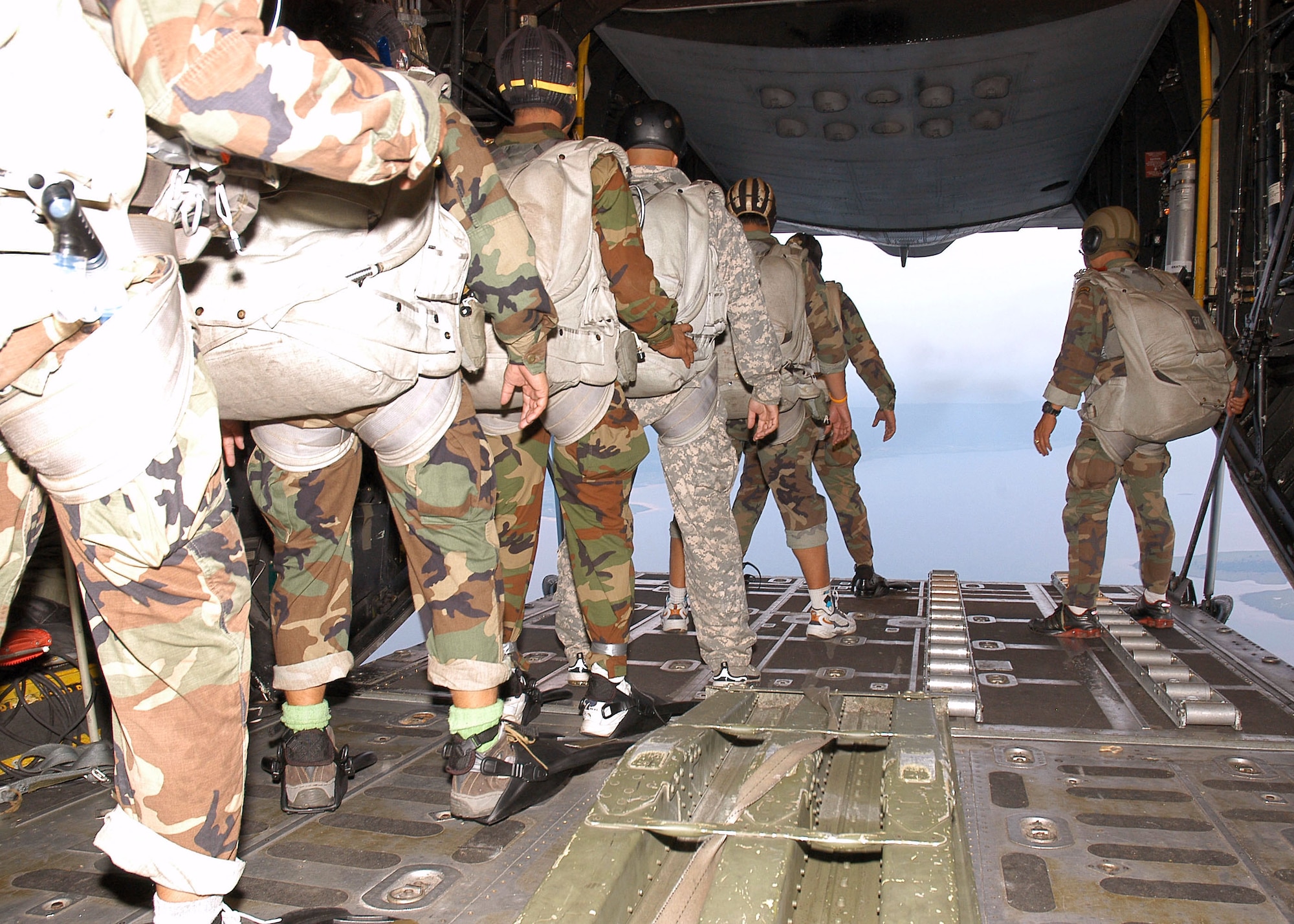 Special forces from the Royal Thai air force prepare to jump from an MC-130P Combat Shadow during Exercise Teak Torch at Udon Thani, Thailand.  The Thai troops and 353rd Special Operations Group Airmen exercised together as part of Pacific Command's joint combined exchange training. (U.S. Air Force photo/Master Sgt. Marilyn Holliday)                           