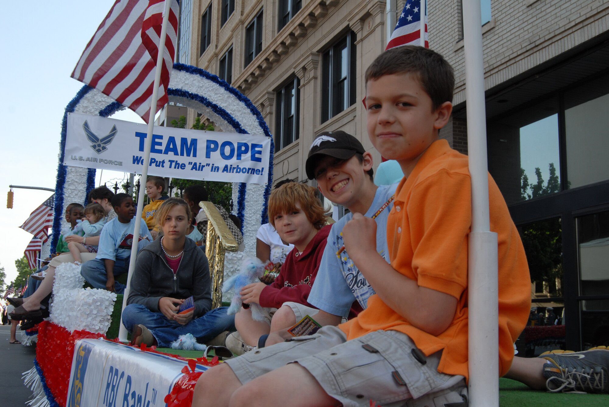 More than 30 Pope members rode on two floats as part of the Salute to Our Troops parade Saturday in Raleigh. (U.S. Air Force Photo by Ed Drohan)