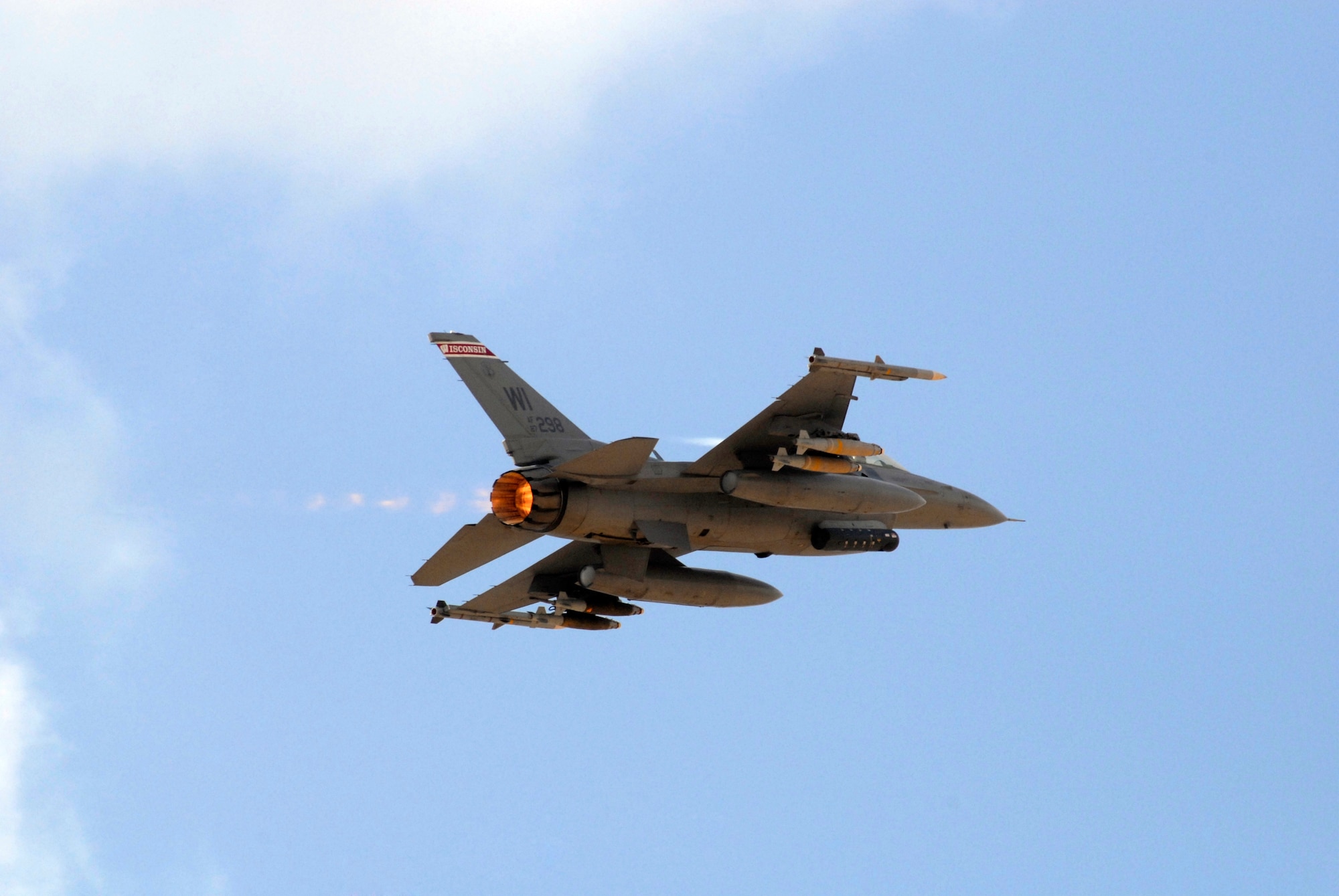 BALAD AIR BASE, Iraq -- An F-16C Fighter Aircraft from the 332nd Expeditionary Wing, Balad Airbase, Iraq performs an afterburner takeoff on its way to fly a combat mission in the skies over Iraq.  Operations, maintenance and support personnel are deployed from the 115th Fighter Wing, Madison, Wisconsin Air National Guard.  Their contributions are in direct support of Operation Iraqi Freedom. (U.S. Air Force Photo by Master Sgt. Daniel Richardson)  (Released)