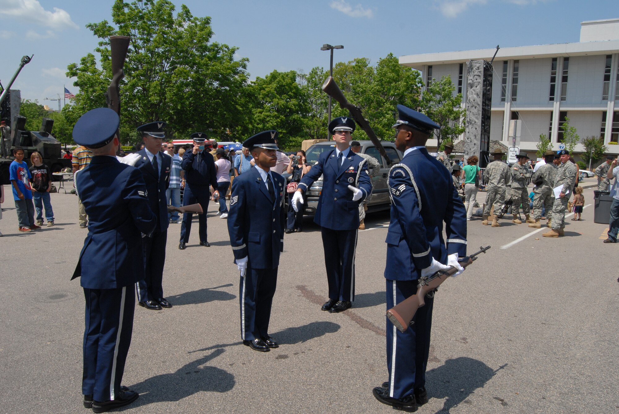The Pope Honor Guard performs rifle drill for the thousands of spectators that attended the “Salute to Our North Carolina Troops” event Saturday in downtown Raleigh. (U.S. Air Force Photo by Ed Drohan)