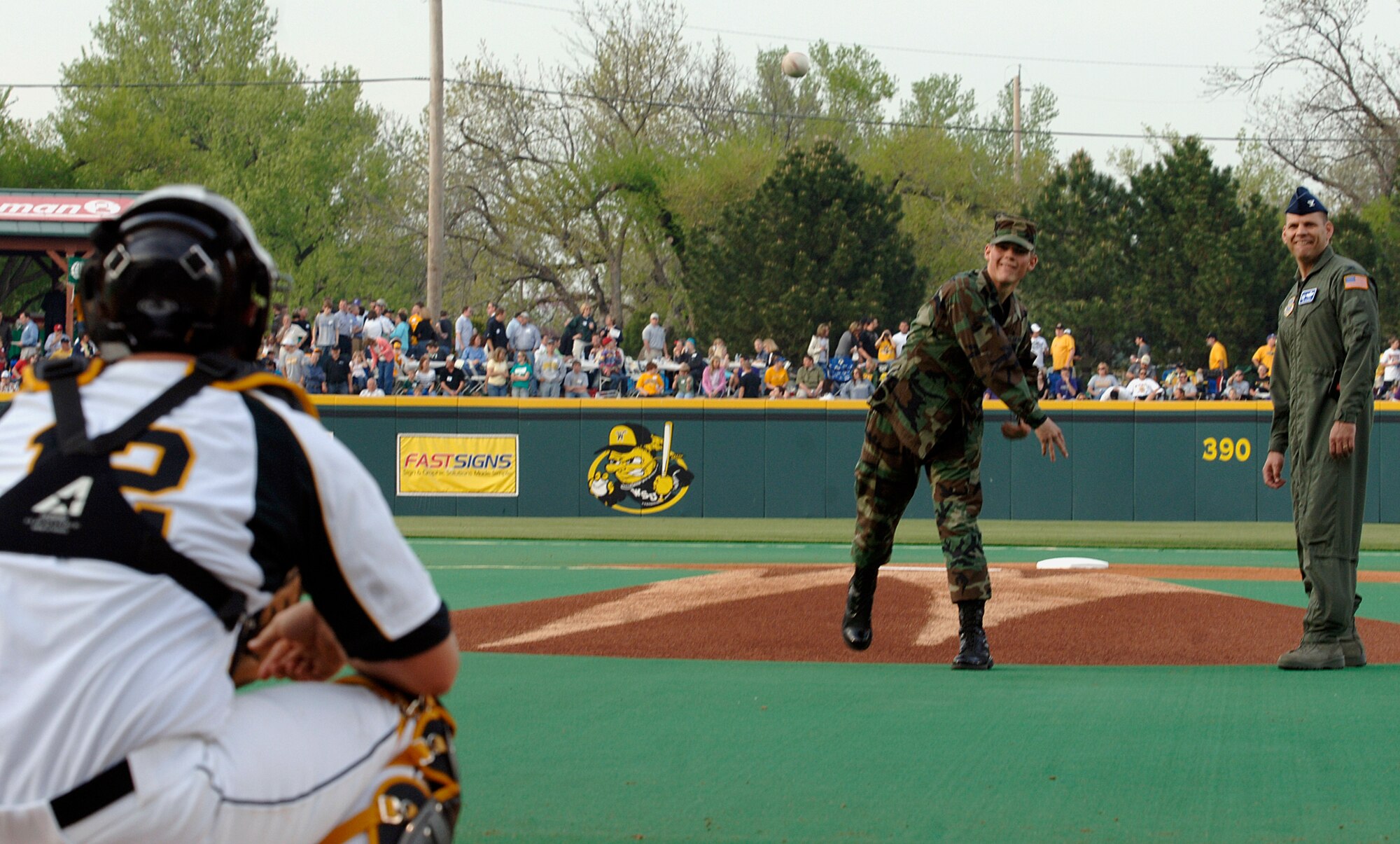 WICHITA, Kan. -- Airman 1st Class Michael Wark, 22nd Communication Squadron, throws the first pitch at a Wichita State University Shocker’s baseball game during Military Appreciation Night at Wichita University’s Eck Stadium April 29. (Photo by Airman Class Justin Shelton)