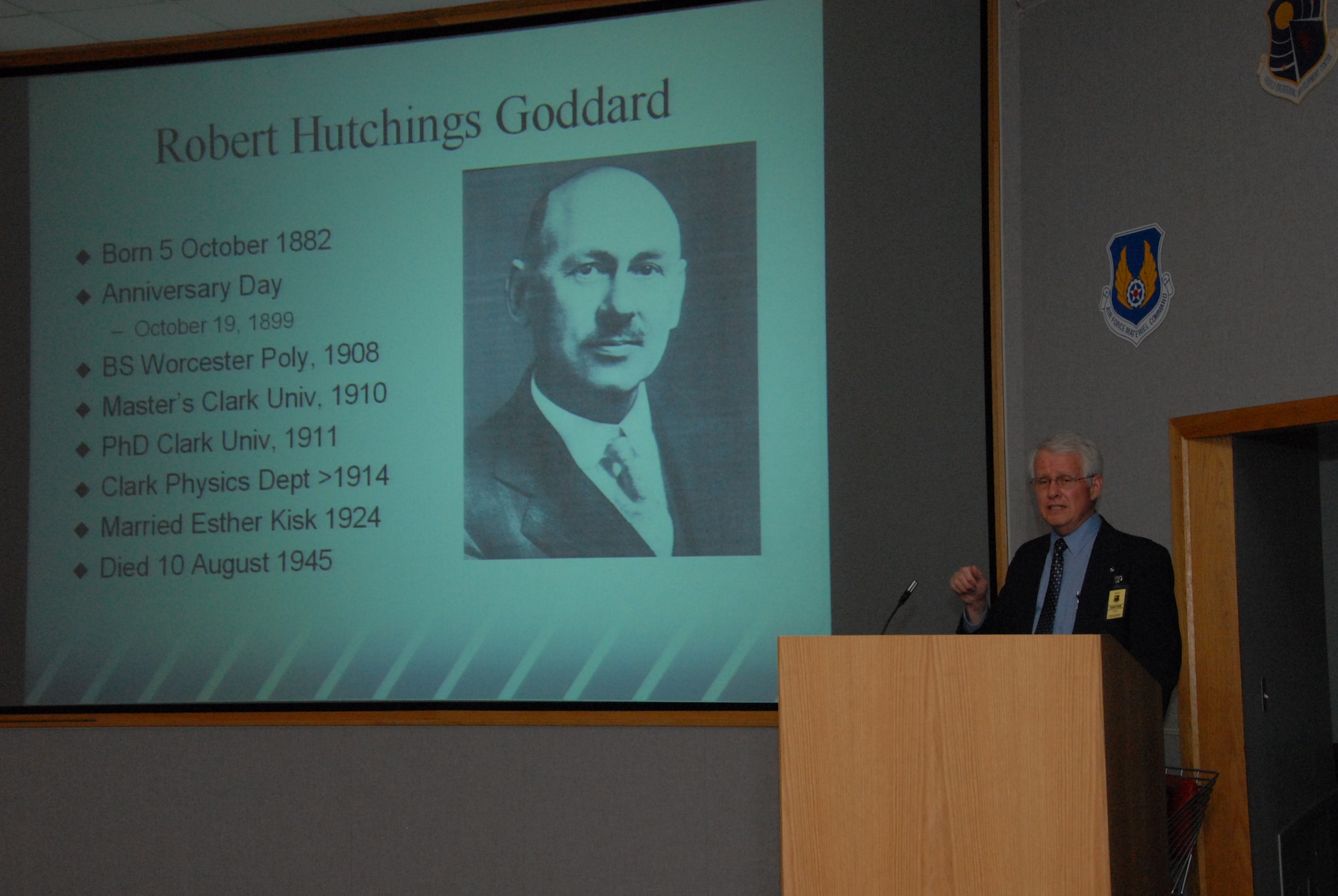 Dr. Arloe Mayne presents his paper on Dr. Robert Goddard—his career and the first liquid-fueled rocket—at the monthly technical excellence forum at Arnold Engineering Development Center, Arnold Air Force Base, Tenn. Dr. Mayne once worked in the center’s von Karman Gas Dynamics Facility. (Photo by David Housch)