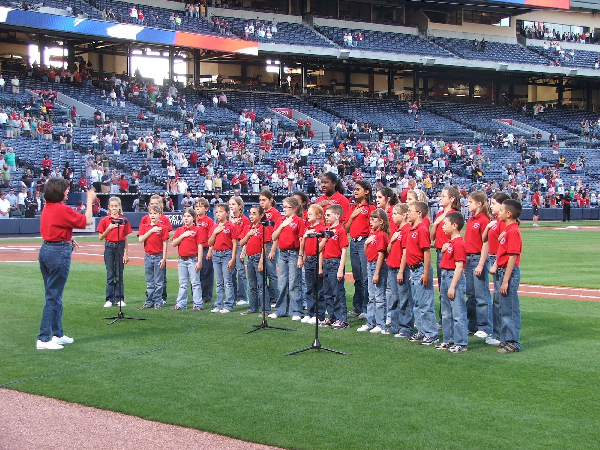 The Robins Elementary Chorus under the direction of Sheila Clopton sings the national anthem at a recent Atlanta Braves baseball game. Courtesy photo