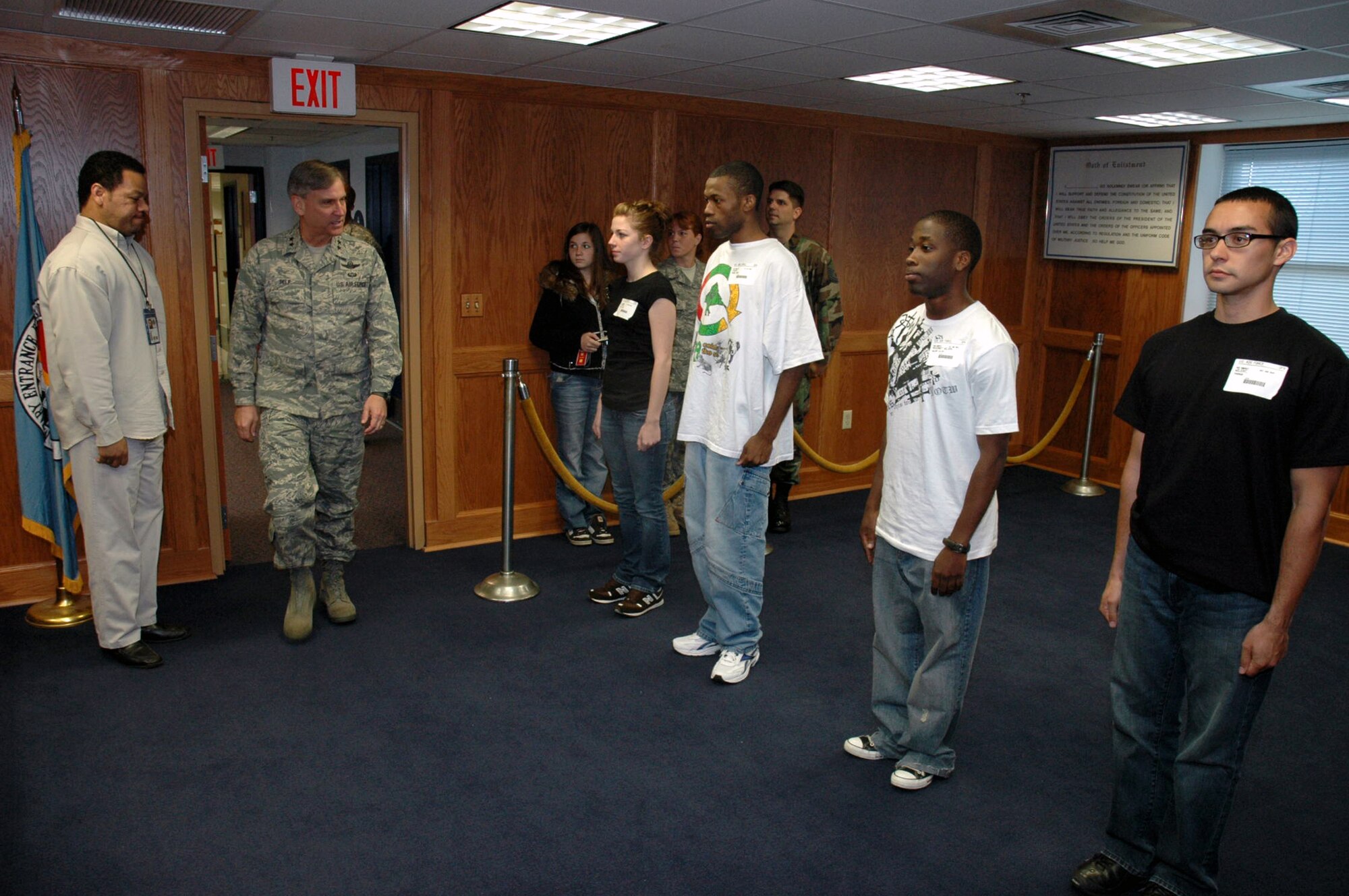 Maj. Gen. Kip Self, U.S. Air Force Expeditionary Center commander, walks into a room at the Fort Dix Military Entrance Processing Station where he will administer the oath of enlistment for five soon-to-be Airmen April 29, 2008, on Fort Dix, N.J.  General Self took the opportunity to do the enlistment oath because one of the enlistees, Nicole Kazimer, is the daughter of Master Sgt. Joe Kazimer of the Center's 421st Combat Training Squadron and Tech. Sgt. Karyn Kazimer of the 108th Air Refueling Wing, McGuire Air Force Base, N.J.  (U.S. Air Force Photo/Tech. Sgt. Scott T. Sturkol)