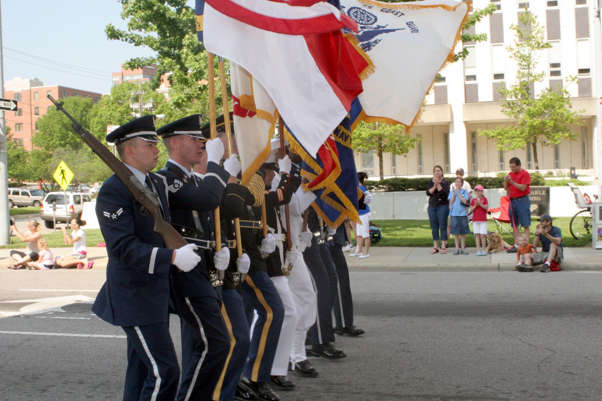 RALEIGH, N.C. - The North Carolina National Guard Joint Forces Color Guard opens the ground festivities for Salute the Troops parade lasting more than an hour in downtown Raleigh April 26. A flyover of four F-15E Strike Eagles from Seymour Johnson AFB signaled the kick-off for the ground events to begin. The event honored the many members of the military in North Carolina and featured lunch, entertainment, and special displays of weaponry, armored vehicles, marine rescue and other equipment throughout the day. (U.S. Air Force photo by Capt. Tana R.H. Stevenson)