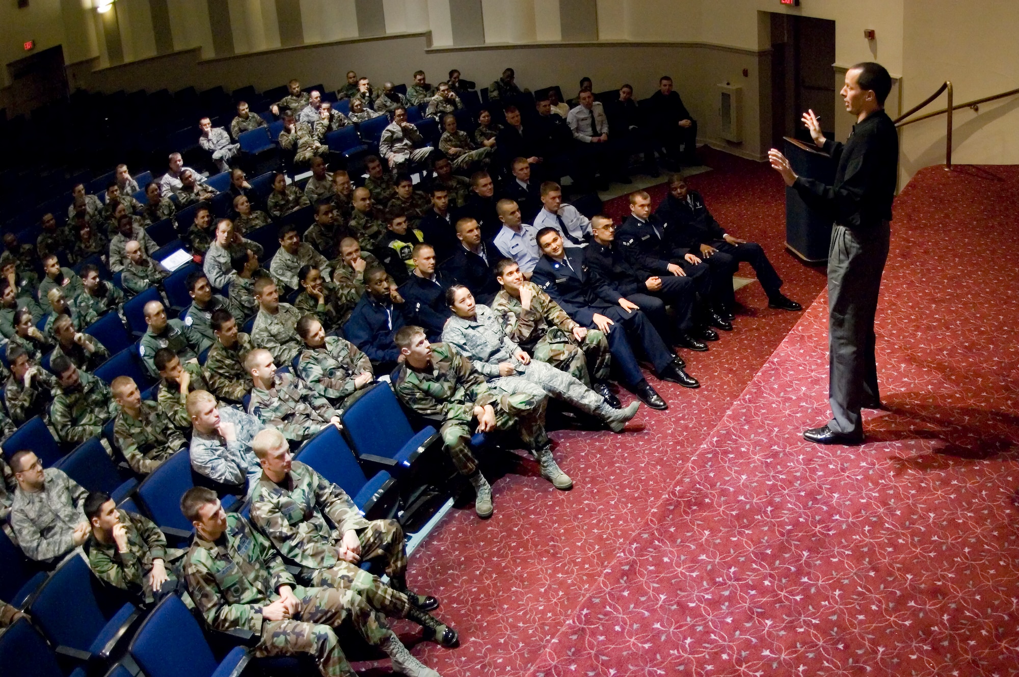 “Can I Kiss You?” speaker Michael Domitrz explains a concept to Airmen about what they can do to prevent sexually-related assaults among their peers as part of a presentation Monday at the base theater.