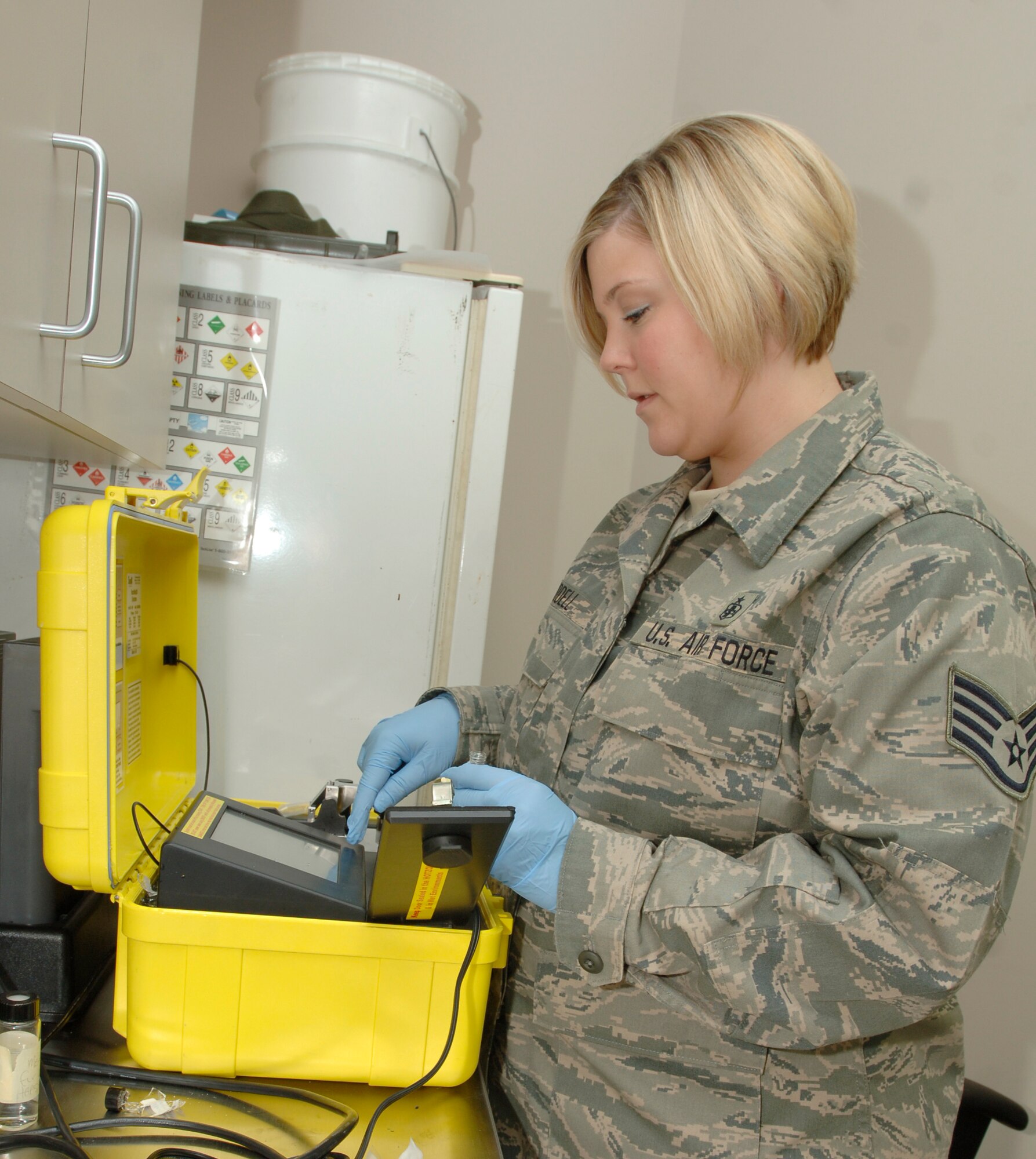 MCCONNELL AIR FORCE BASE, Kan. -- Staff Sgt. Lisa Liddell, 22nd Aerospace Medicine Squadron, testing a sample on a Hazmat ID System at the clinic, April 29. Hazmat ID System has excellent results in white powder responses.  (Photo by Senior Airman Roy Lynch III)