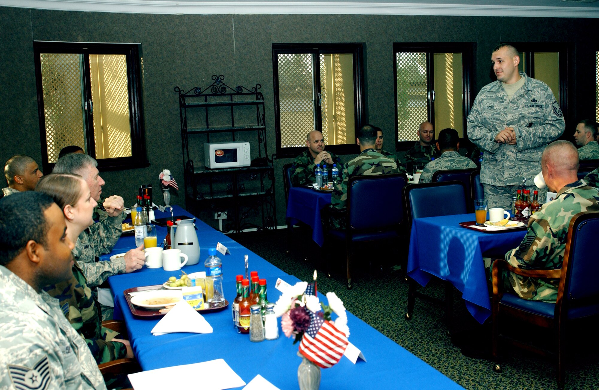 Master Sgt. Christopher Greek, 39th Security Forces Squadron, poses a question to Gen. Roger Brady, United States Air Forces in Europe commander, during a breakfast at the Sultan's Inn dining facility April 29. General Brady attended the breakfast with many Airmen from around the base during his visit to Incirlik April 28-29. (U.S. Air Force photo by Senior Airman Heather Stanton)