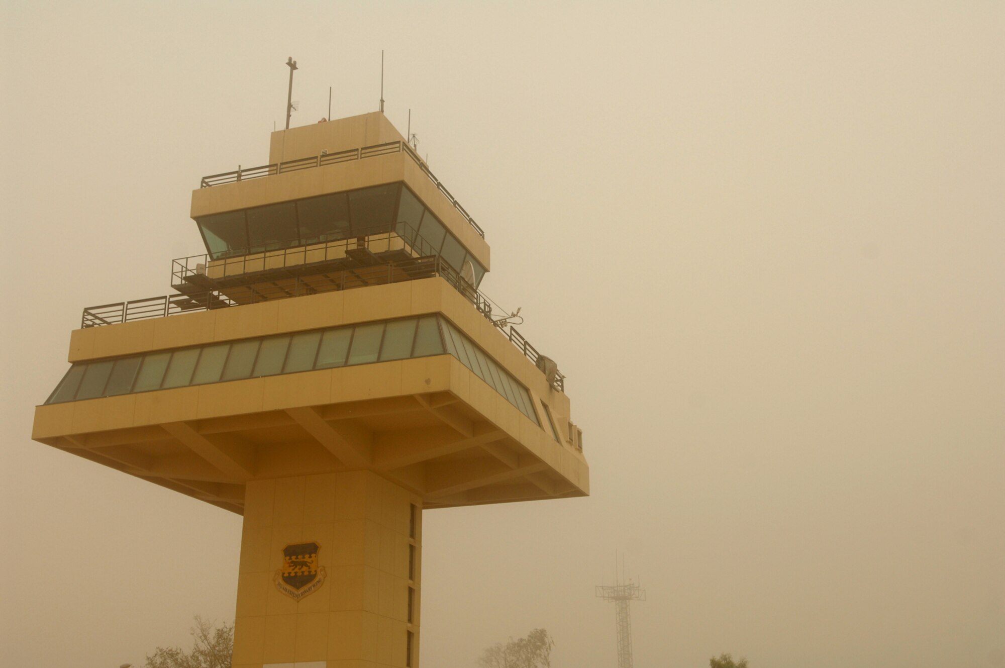 BALAD AIR BASE, Iraq -- The air traffic control tower is the focal command and control element of the airfield here. The controllers who work in the tower coordinate the movement and flow of aircraft and vehicles on the Balad Air Base flightline. (U.S. Air Force photo/ Senior Airman Julianne Showalter)