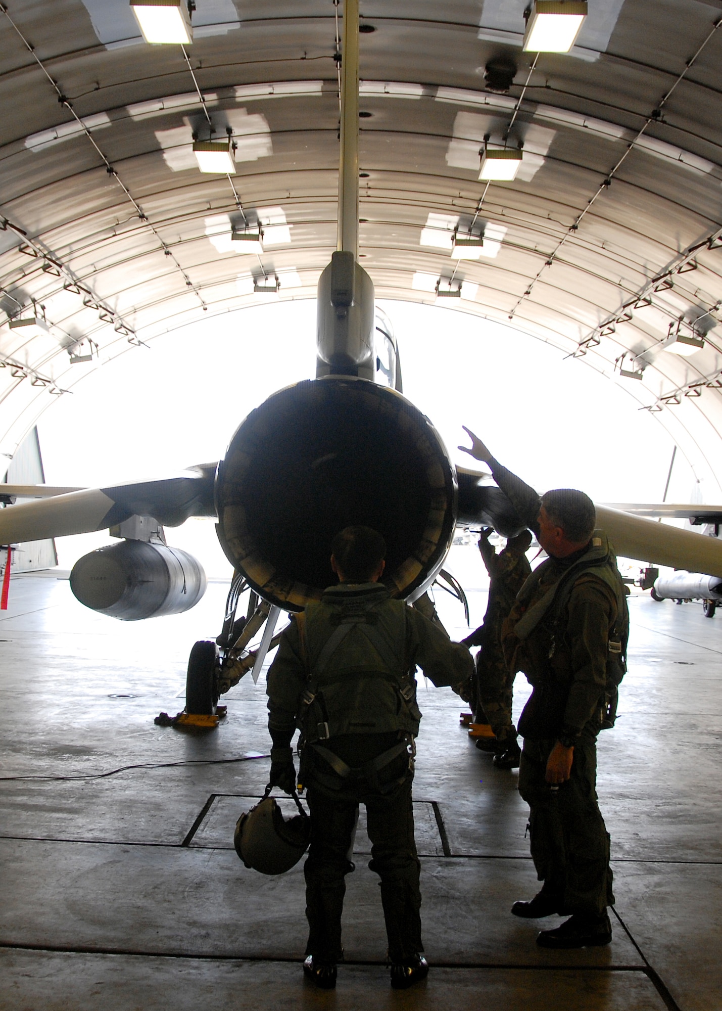 MISAWA AIR BASE, Japan -- Lt. Gen. Shigeru Irizawa, Northern Air Defense Force commander, and Col. Joel Malone, 35th Fighter Wing vice commander, perform a safety inspection on an F-16 Fighting Falcon prior to a familiarization flight here on April 15, 2008. General Irizawa and Maj. Gen. Hideo Wakabayashi, 3rd Air Wing commander, both received F-16 familiarization flights to help promote understanding between U.S. and Japanese forces.(U.S. Air Force photo by Senior Airman Chad Strohmeyer)
