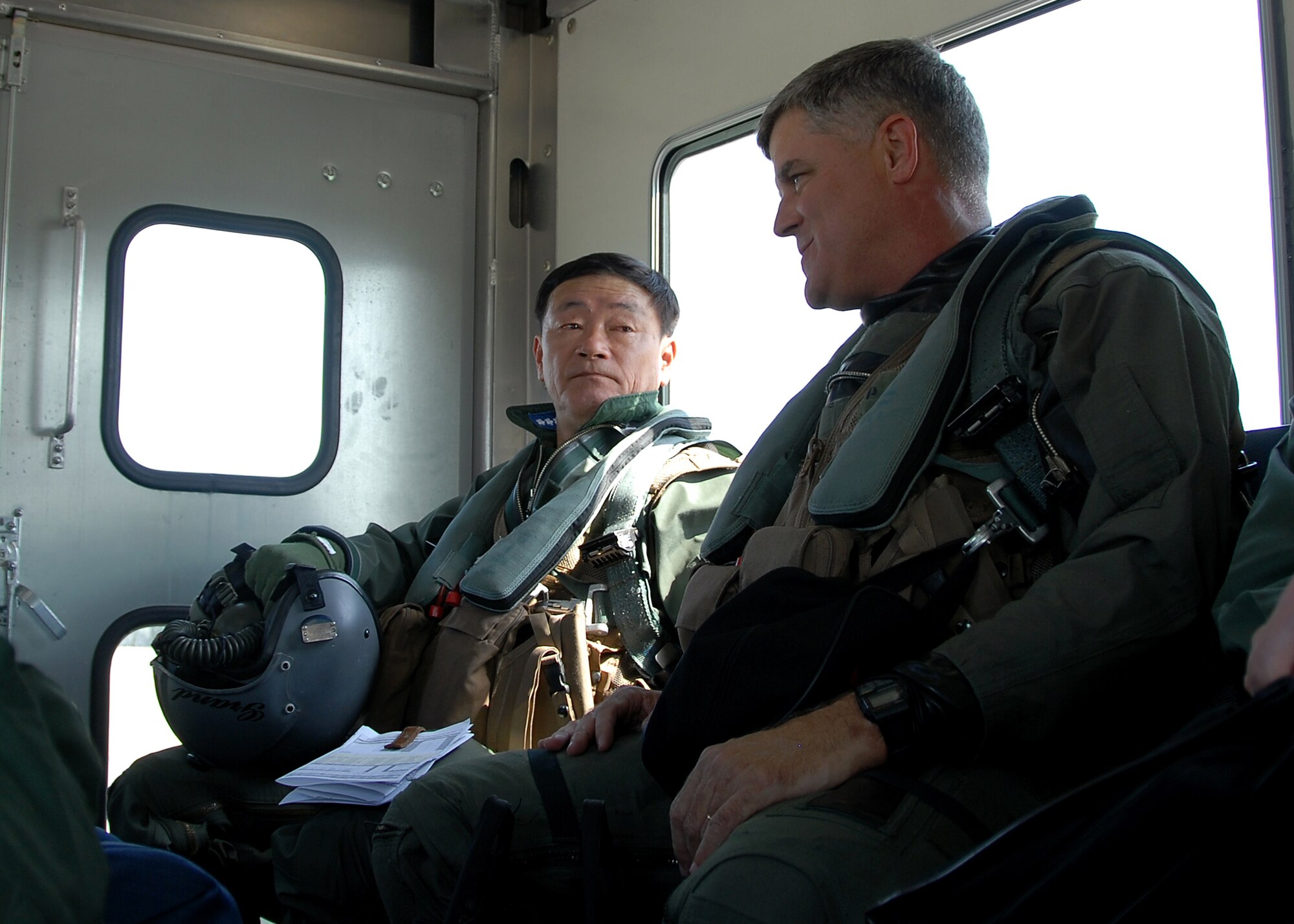 MISAWA AIR BASE, Japan -- Lt. Gen. Shigeru Irizawa, Northern Air Defense Force commander, is driven onto the runway for a F-16 familiarization flight here April 15, 2008.  Col. Joel Malone, 35th Fighter Wing vice commander, was his pilot for the flight. (U.S. Air Force photo by Senior Airman Chad Strohmeyer)
