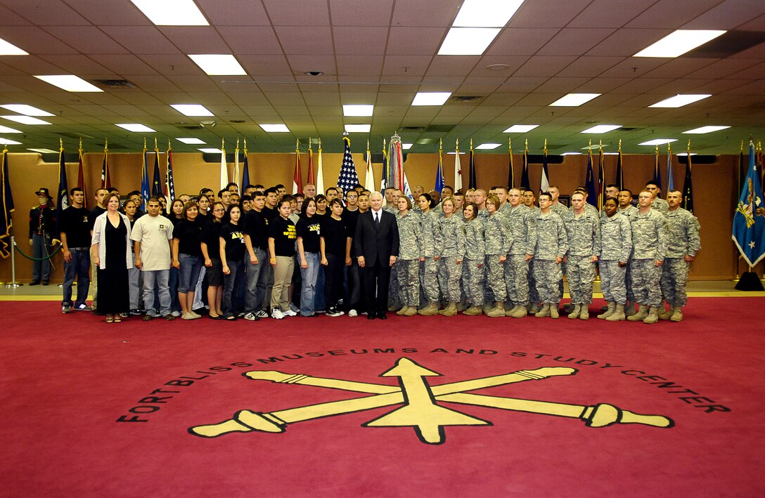 Fortyfive new Army enlistees and 28 reenlistees take a group photo