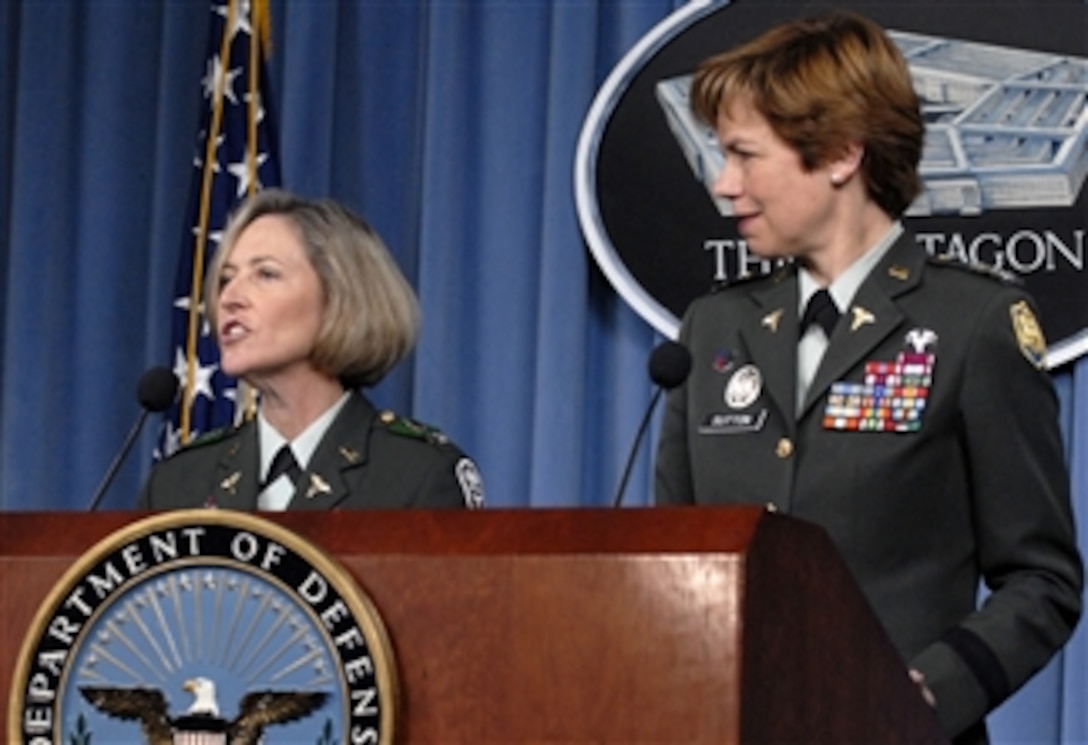Commander, Walter Reed Health Care System Col. Patricia Horoho (left), U.S. Army, answers a reporter's question during a press conference with Special Assistant to the Assistant Secretary of Defense for Health Affairs Col. Loree Sutton in the Pentagon on May 1, 2008.  Horoho and Sutton briefed reporters on new guidelines for soldiers with mental-health issues.  