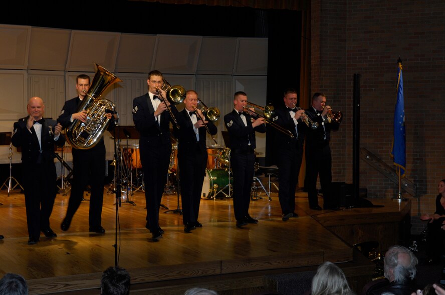 Members of Brass in Blue, an ensemble of the U.S. Air Force Heartland of America Band, perform at the Minot High School Magic City Campus April 25. The concert was sponsored by Minot Daily News and Minot Public Schools. (U.S. Air Force photo by Maj. Elizabeth Ortiz)