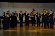Members of Brass in Blue, an ensemble of the U.S. Air Force Heartland of America Band, perform at the Minot High School Magic City Campus April 25. The concert was sponsored by Minot Daily News and Minot Public Schools. (U.S. Air Force photo by Maj. Elizabeth Ortiz)