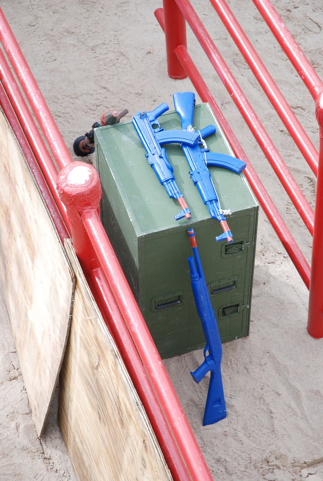 A weapons cache awaits members of the joint 21st/721st Security Forces Squadron Guardian Challenge team May 2 at the U.S. Air Force Academy, Colo. The team competed against others throughout Air Force Space Command to determine which is the “best of the best” in defending installations and space assets world-wide. The six-man team is comprised of Tech. Sgt. Cesar Ochoa, Staff Sgts. Jordan Freeman, Brian Marshall and Jeffrey Turner, Senior Airman Eric Frias and Airman Stacy John. (U.S. Air Force photo/Senior Airman Stephen Collier)