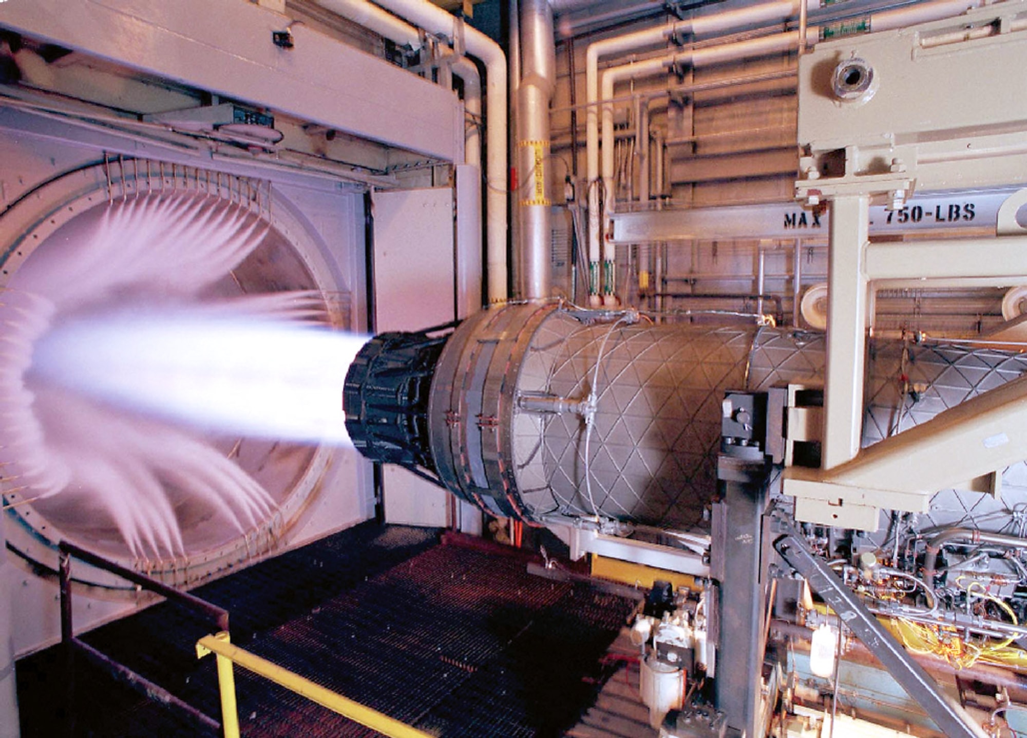 A Pratt and Whitney F100 engine, the powerplant for the F-15 Eagle and F-16 Fighting Falcon, undergoes sea level testing in Arnold Engineering Development Center's Propulsion Development Test Cell J-2 at Arnold Air Force Base, Tenn. (U.S. Air Force file photo)
